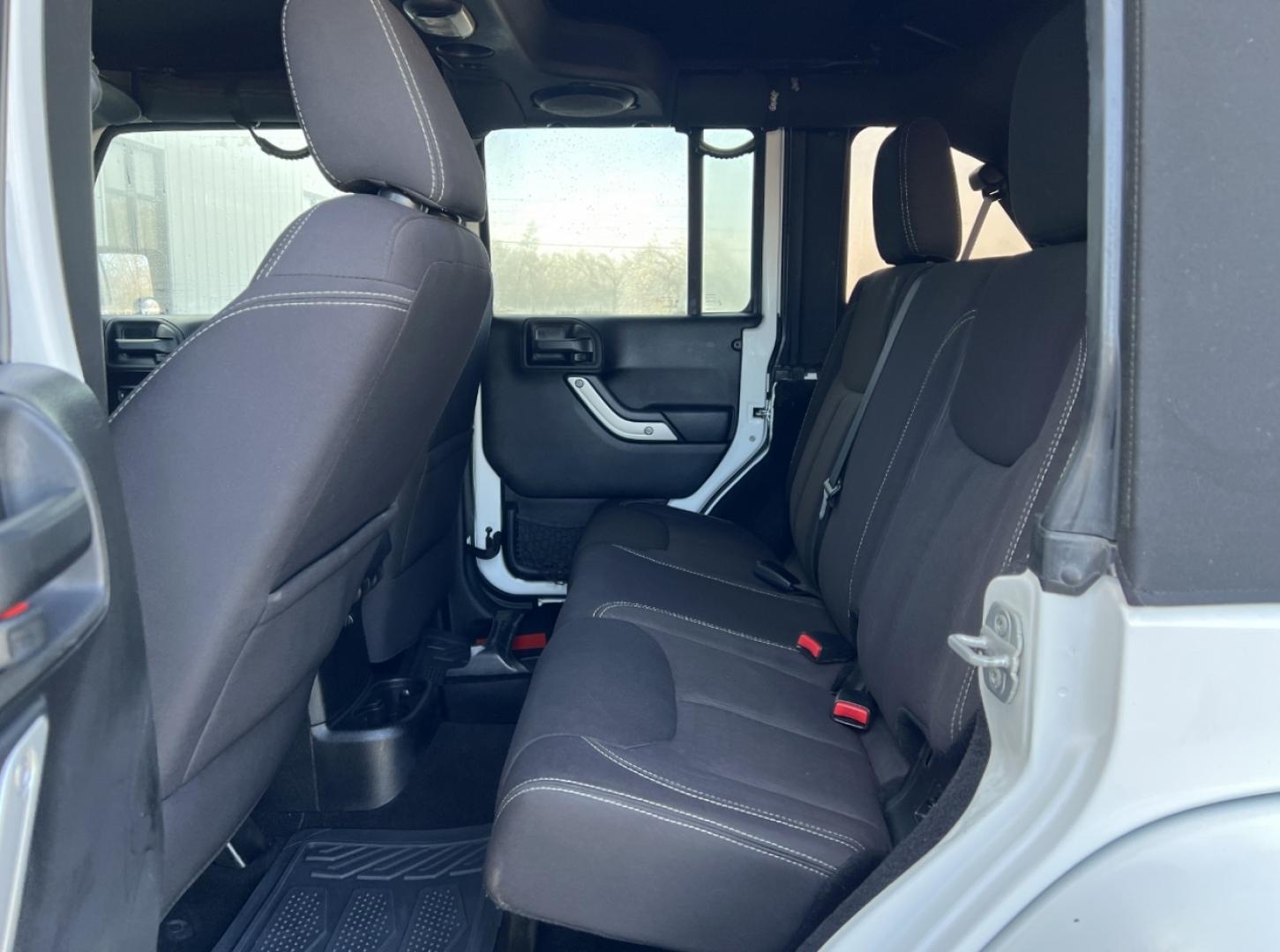 2014 WHITE /Black Cloth Jeep Wrangler Unlimited Sahara (1C4BJWEG1EL) with an 3.6L V6 engine, Automatic transmission, located at 506 S. Kingshighway, Cape Girardeau, MO, 63703, (573) 235-5000, 37.294991, -89.553635 - 2014 Jeep Wrangler Unlimited Sahara Only 48xxx miles 4x4 3.6L V6 Automatic Local Trade-In 20" Wheels Cruise Power Windows/Locks/Mirrors We have financing available and we accept trades! Fill out a credit application on our website or come by today! If you have any questions, give us a call - Photo#14
