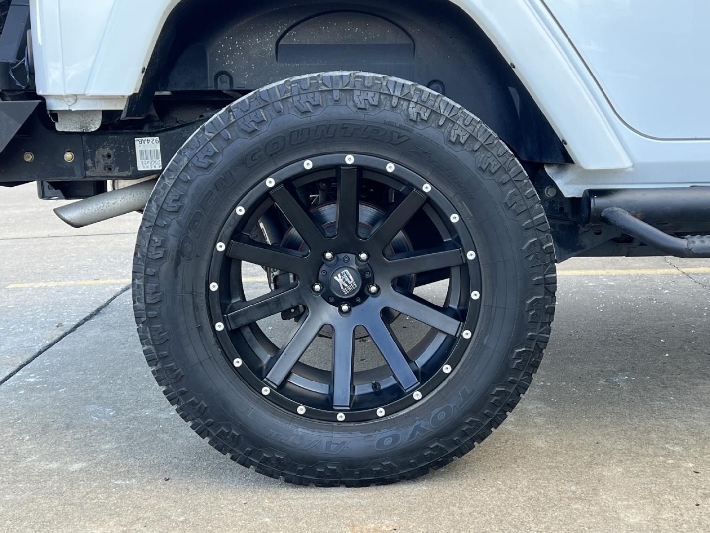 2014 WHITE /Black Cloth Jeep Wrangler Unlimited Sahara (1C4BJWEG1EL) with an 3.6L V6 engine, Automatic transmission, located at 506 S. Kingshighway, Cape Girardeau, MO, 63703, (573) 235-5000, 37.294991, -89.553635 - 2014 Jeep Wrangler Unlimited Sahara Only 48xxx miles 4x4 3.6L V6 Automatic Local Trade-In 20" Wheels Cruise Power Windows/Locks/Mirrors We have financing available and we accept trades! Fill out a credit application on our website or come by today! If you have any questions, give us a call - Photo#31
