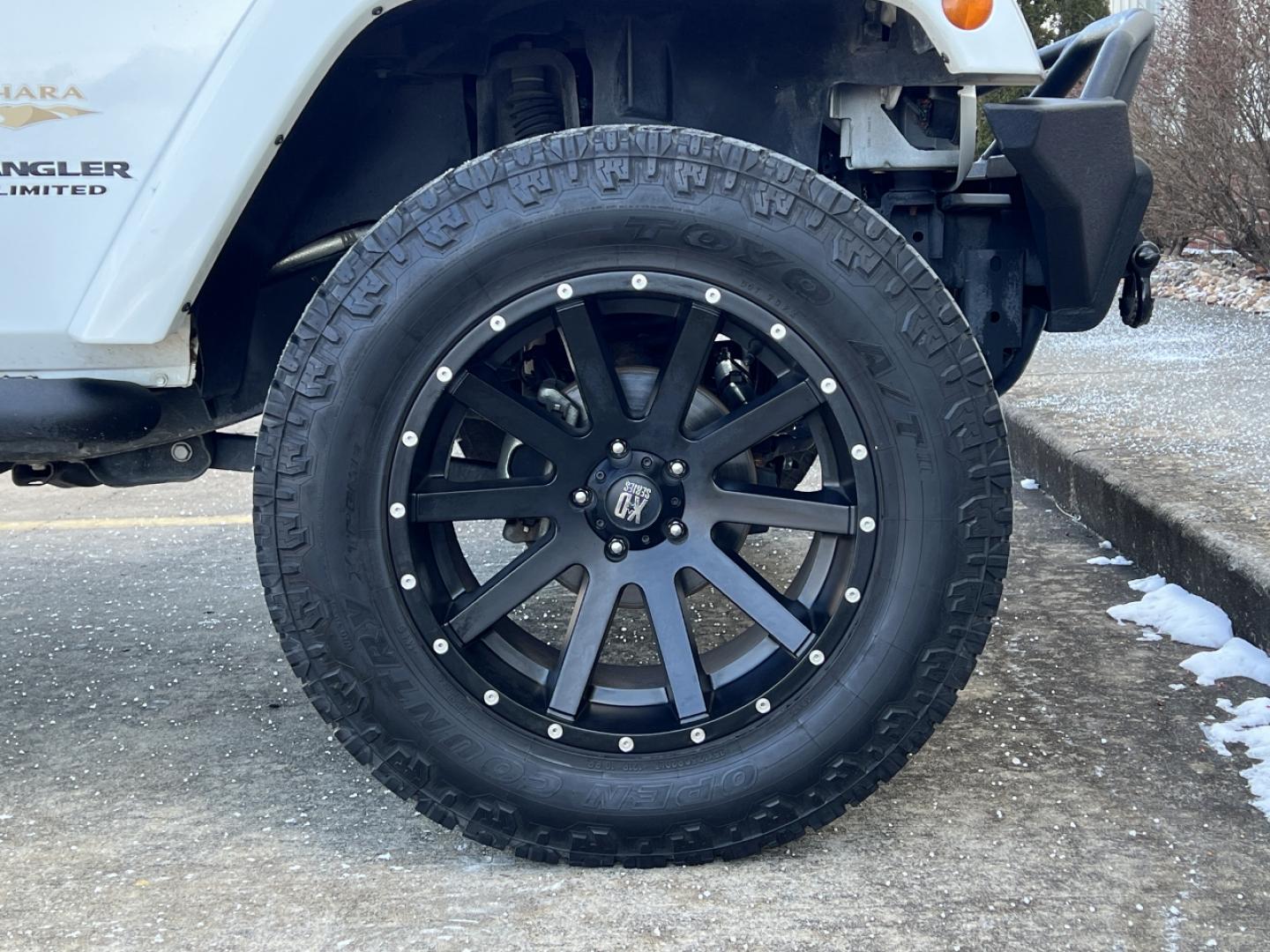 2014 WHITE /Black Cloth Jeep Wrangler Unlimited Sahara (1C4BJWEG1EL) with an 3.6L V6 engine, Automatic transmission, located at 506 S. Kingshighway, Cape Girardeau, MO, 63703, (573) 235-5000, 37.294991, -89.553635 - 2014 Jeep Wrangler Unlimited Sahara Only 48xxx miles 4x4 3.6L V6 Automatic Local Trade-In 20" Wheels Cruise Power Windows/Locks/Mirrors We have financing available and we accept trades! Fill out a credit application on our website or come by today! If you have any questions, give us a call - Photo#32