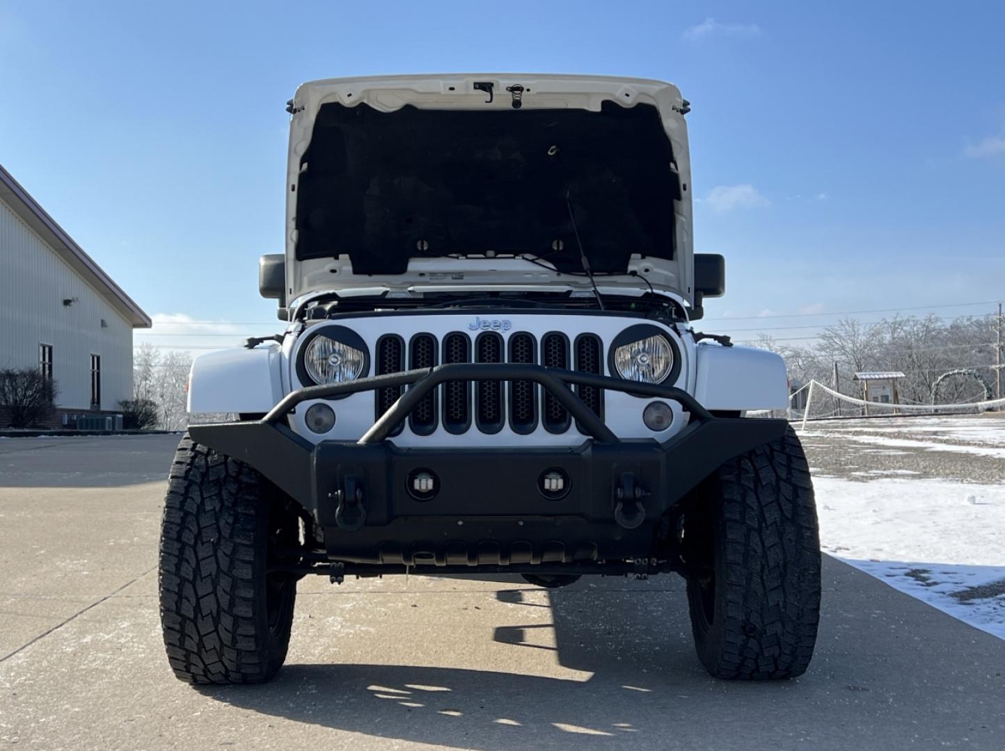 2014 WHITE /Black Cloth Jeep Wrangler Unlimited Sahara (1C4BJWEG1EL) with an 3.6L V6 engine, Automatic transmission, located at 506 S. Kingshighway, Cape Girardeau, MO, 63703, (573) 235-5000, 37.294991, -89.553635 - 2014 Jeep Wrangler Unlimited Sahara Only 48xxx miles 4x4 3.6L V6 Automatic Local Trade-In 20" Wheels Cruise Power Windows/Locks/Mirrors We have financing available and we accept trades! Fill out a credit application on our website or come by today! If you have any questions, give us a call - Photo#26