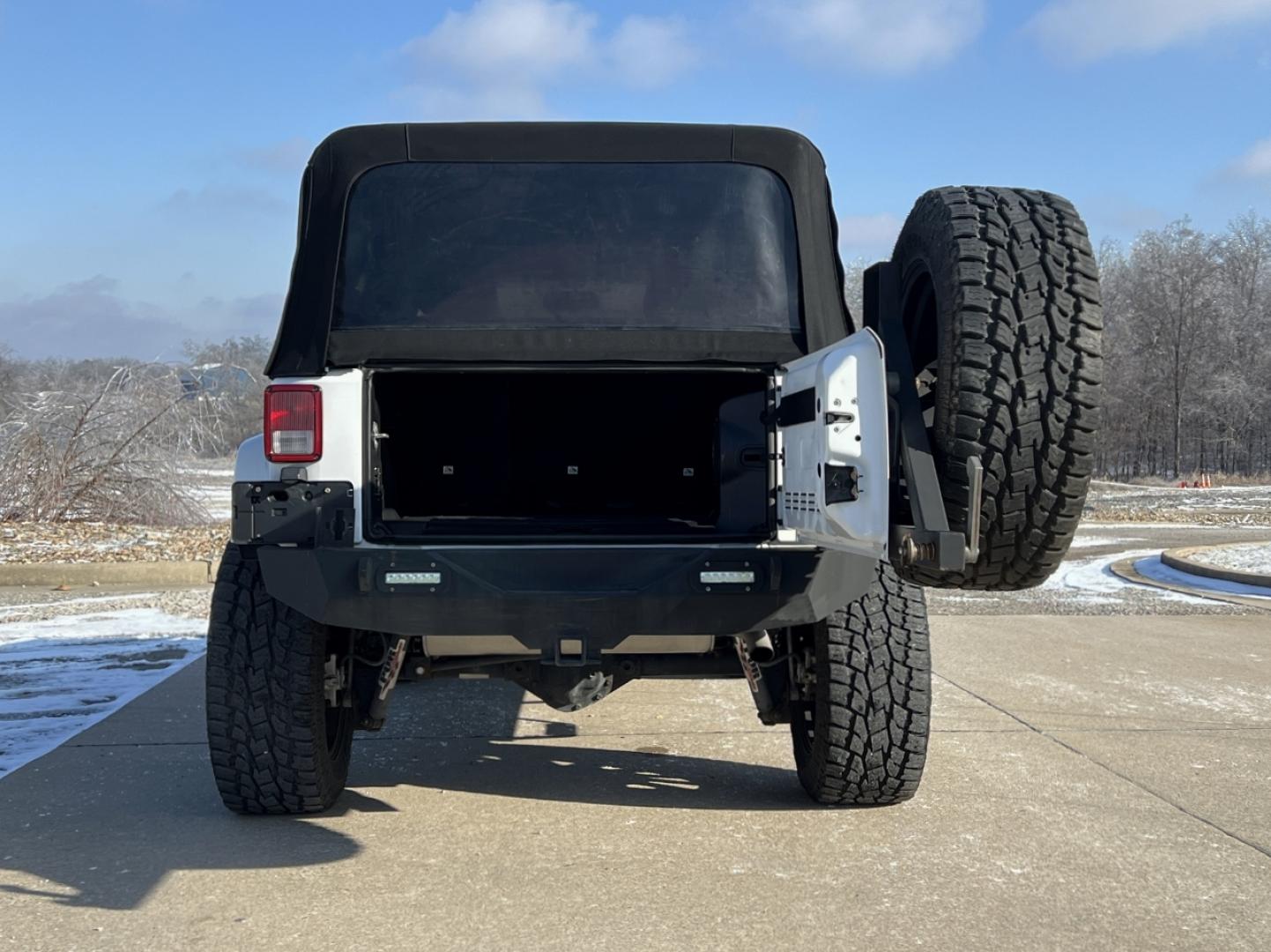 2014 WHITE /Black Cloth Jeep Wrangler Unlimited Sahara (1C4BJWEG1EL) with an 3.6L V6 engine, Automatic transmission, located at 506 S. Kingshighway, Cape Girardeau, MO, 63703, (573) 235-5000, 37.294991, -89.553635 - 2014 Jeep Wrangler Unlimited Sahara Only 48xxx miles 4x4 3.6L V6 Automatic Local Trade-In 20" Wheels Cruise Power Windows/Locks/Mirrors We have financing available and we accept trades! Fill out a credit application on our website or come by today! If you have any questions, give us a call - Photo#16