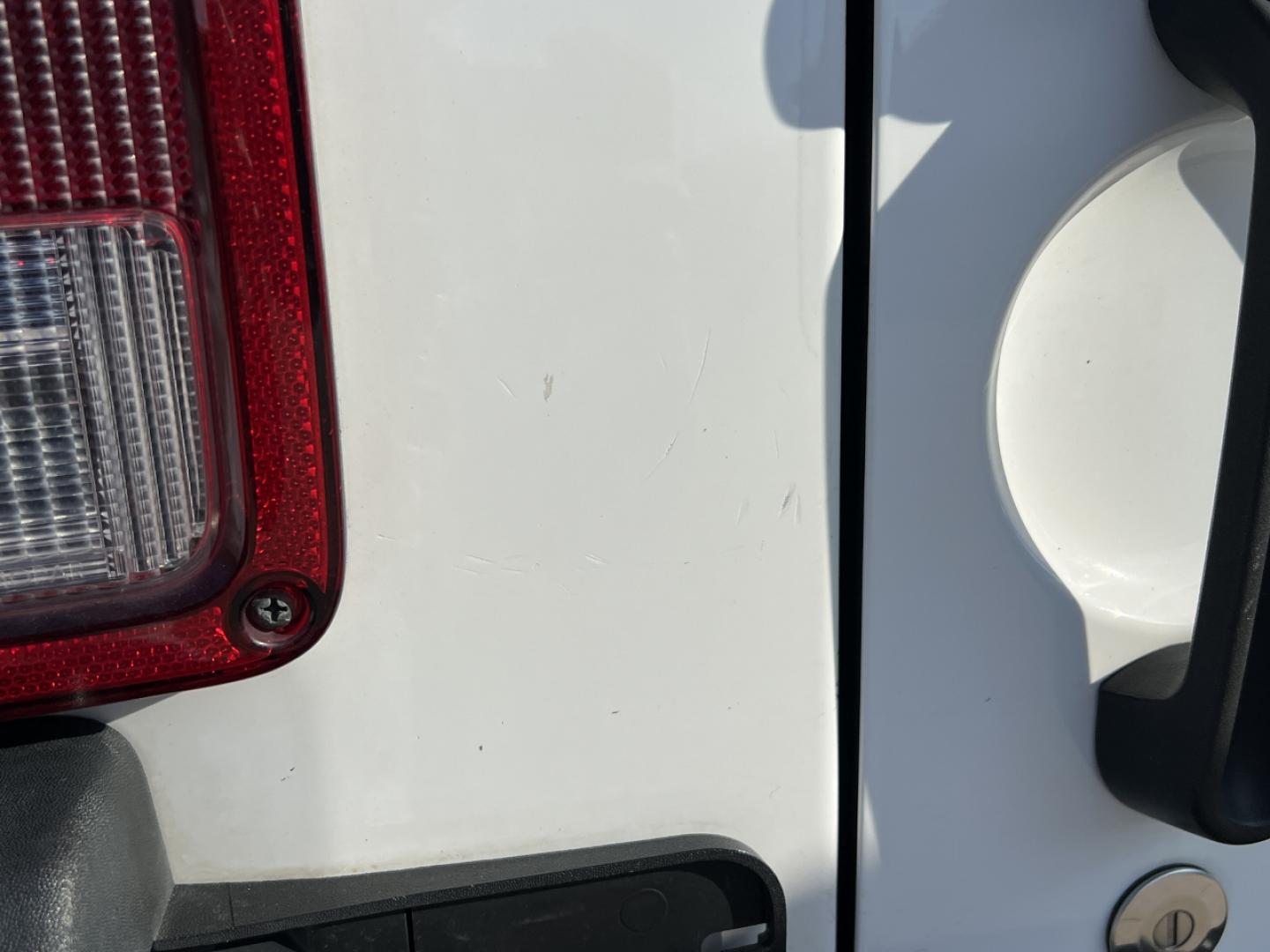 2014 WHITE /Black Cloth Jeep Wrangler Unlimited Sahara (1C4BJWEG1EL) with an 3.6L V6 engine, Automatic transmission, located at 506 S. Kingshighway, Cape Girardeau, MO, 63703, (573) 235-5000, 37.294991, -89.553635 - 2014 Jeep Wrangler Unlimited Sahara Only 48xxx miles 4x4 3.6L V6 Automatic Local Trade-In 20" Wheels Cruise Power Windows/Locks/Mirrors We have financing available and we accept trades! Fill out a credit application on our website or come by today! If you have any questions, give us a call - Photo#34