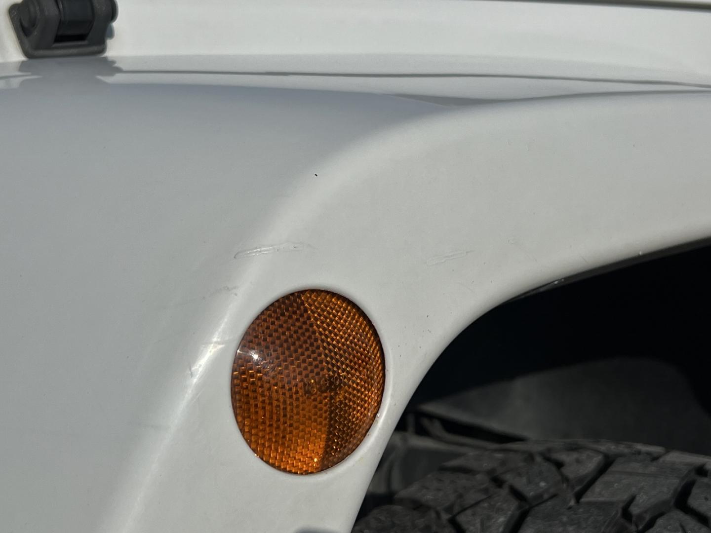 2014 WHITE /Black Cloth Jeep Wrangler Unlimited Sahara (1C4BJWEG1EL) with an 3.6L V6 engine, Automatic transmission, located at 506 S. Kingshighway, Cape Girardeau, MO, 63703, (573) 235-5000, 37.294991, -89.553635 - 2014 Jeep Wrangler Unlimited Sahara Only 48xxx miles 4x4 3.6L V6 Automatic Local Trade-In 20" Wheels Cruise Power Windows/Locks/Mirrors We have financing available and we accept trades! Fill out a credit application on our website or come by today! If you have any questions, give us a call - Photo#37