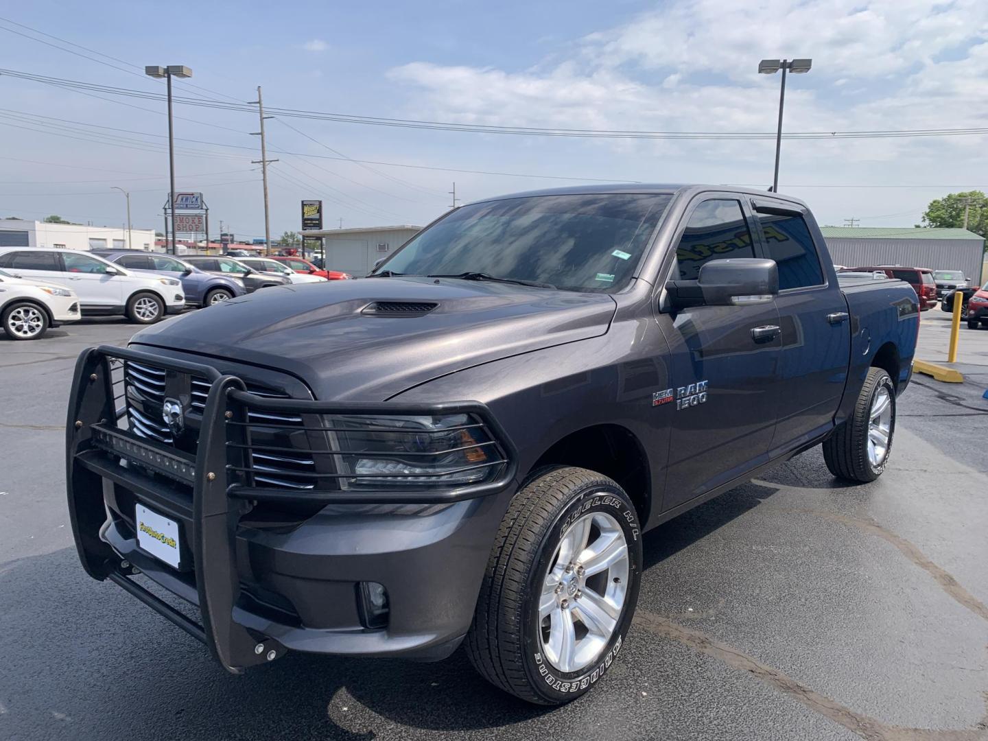 2015 GRAY /Black Leather/Cloth RAM 1500 SPORT (1C6RR7MT7FS) with an 5.7L V8 engine, Automatic transmission, located at 506 S. Kingshighway, Cape Girardeau, MO, 63703, (573) 235-5000, 37.294991, -89.553635 - 2015 Ram 1500 Sport 167xxx miles 4x4 5.7L V8 Automatic Leather Navigation Backup Camera Heated Seats Heated Steering Wheel Power Driver Seat Power Running Boards Bluetooth 20" Wheels Cruise Remote Start Power Windows/Locks/Mirrors We have financing available and we accept trades! Fi - Photo#3