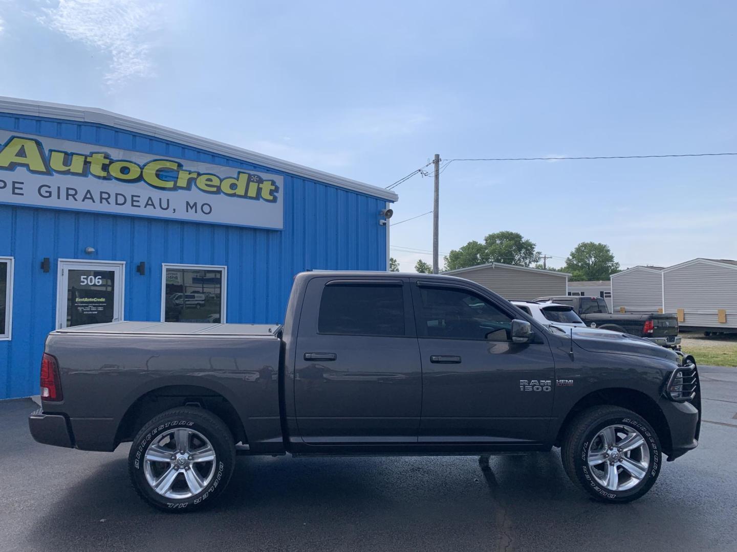 2015 GRAY /Black Leather/Cloth RAM 1500 SPORT (1C6RR7MT7FS) with an 5.7L V8 engine, Automatic transmission, located at 506 S. Kingshighway, Cape Girardeau, MO, 63703, (573) 235-5000, 37.294991, -89.553635 - 2015 Ram 1500 Sport 167xxx miles 4x4 5.7L V8 Automatic Leather Navigation Backup Camera Heated Seats Heated Steering Wheel Power Driver Seat Power Running Boards Bluetooth 20" Wheels Cruise Remote Start Power Windows/Locks/Mirrors We have financing available and we accept trades! Fi - Photo#10