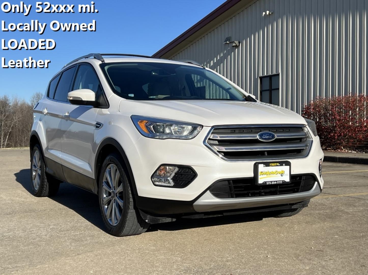 2017 WHITE /Tan FORD ESCAPE TITANIUM (1FMCU0J98HU) with an 2.0L engine, Automatic transmission, located at 2990 Old Orchard Rd., Jackson, MO, 63755, 37.354214, -89.612106 - Photo#0