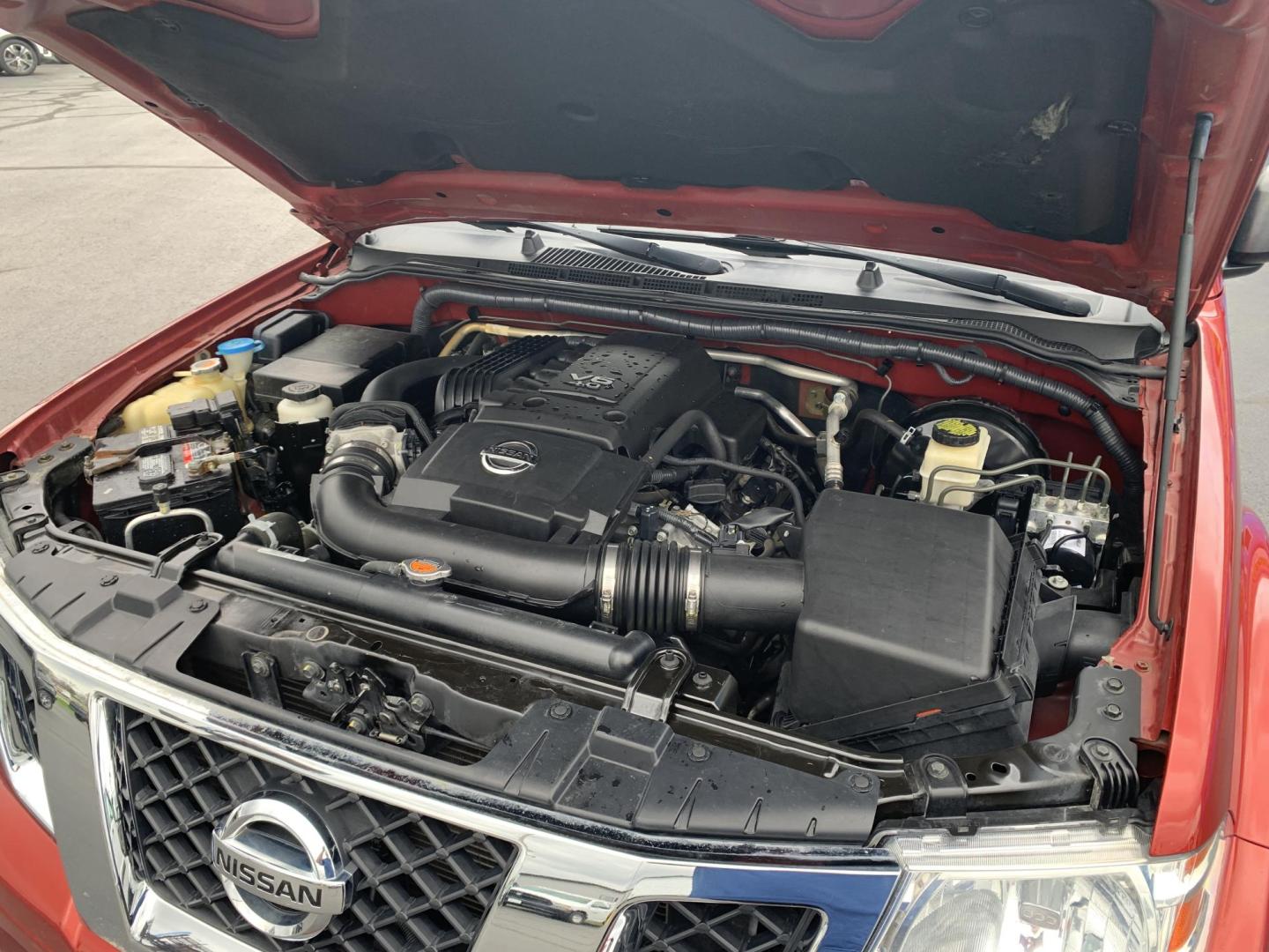 2016 MAROON /Black Cloth Nissan Frontier SV 4WD (1N6AD0CW1GN) with an 4.0L V6 engine, Automatic transmission, located at 506 S. Kingshighway, Cape Girardeau, MO, 63703, (573) 235-5000, 37.294991, -89.553635 - 2016 Nissan Frontier SV Only 93xxx miles 4x4 4.0L V6 Automatic Backup Camera Heated Seats Cruise Power Windows/Locks/Mirrors We have financing available and we accept trades! Fill out a credit application on our website or come by today! If you have any questions, give us a call at (573) - Photo#2