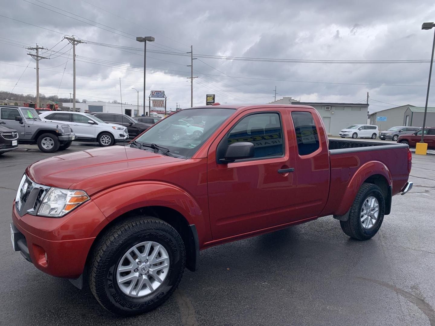 2016 MAROON /Black Cloth Nissan Frontier SV 4WD (1N6AD0CW1GN) with an 4.0L V6 engine, Automatic transmission, located at 506 S. Kingshighway, Cape Girardeau, MO, 63703, (573) 235-5000, 37.294991, -89.553635 - 2016 Nissan Frontier SV Only 93xxx miles 4x4 4.0L V6 Automatic Backup Camera Heated Seats Cruise Power Windows/Locks/Mirrors We have financing available and we accept trades! Fill out a credit application on our website or come by today! If you have any questions, give us a call at (573) - Photo#3