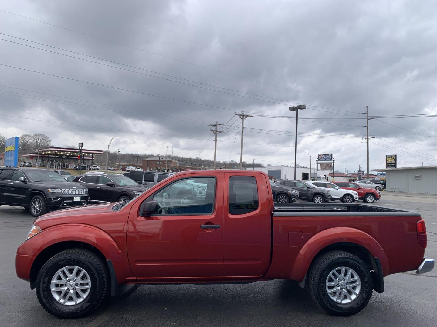 2016 MAROON /Black Cloth Nissan Frontier SV 4WD (1N6AD0CW1GN) with an 4.0L V6 engine, Automatic transmission, located at 506 S. Kingshighway, Cape Girardeau, MO, 63703, (573) 235-5000, 37.294991, -89.553635 - 2016 Nissan Frontier SV Only 93xxx miles 4x4 4.0L V6 Automatic Backup Camera Heated Seats Cruise Power Windows/Locks/Mirrors We have financing available and we accept trades! Fill out a credit application on our website or come by today! If you have any questions, give us a call at (573) - Photo#4