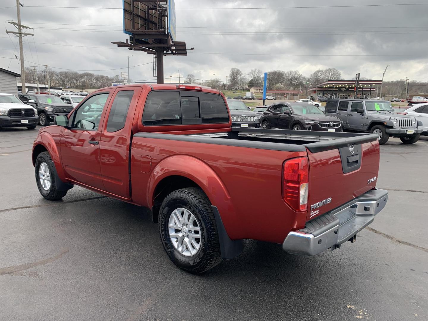 2016 MAROON /Black Cloth Nissan Frontier SV 4WD (1N6AD0CW1GN) with an 4.0L V6 engine, Automatic transmission, located at 506 S. Kingshighway, Cape Girardeau, MO, 63703, (573) 235-5000, 37.294991, -89.553635 - 2016 Nissan Frontier SV Only 93xxx miles 4x4 4.0L V6 Automatic Backup Camera Heated Seats Cruise Power Windows/Locks/Mirrors We have financing available and we accept trades! Fill out a credit application on our website or come by today! If you have any questions, give us a call at (573) - Photo#5