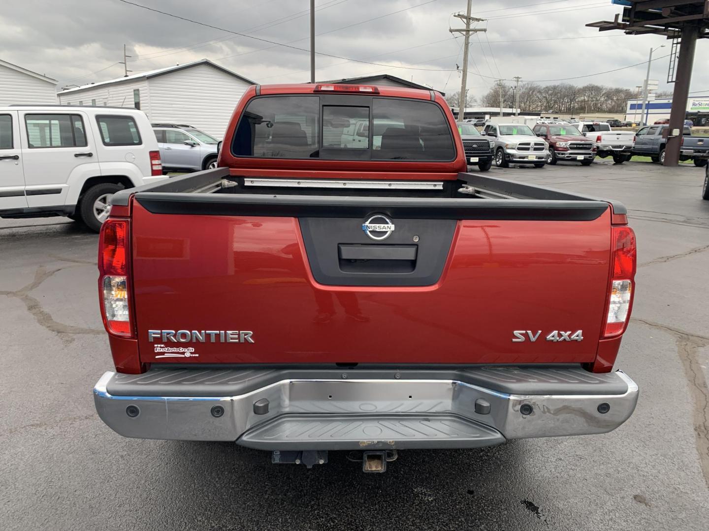 2016 MAROON /Black Cloth Nissan Frontier SV 4WD (1N6AD0CW1GN) with an 4.0L V6 engine, Automatic transmission, located at 506 S. Kingshighway, Cape Girardeau, MO, 63703, (573) 235-5000, 37.294991, -89.553635 - 2016 Nissan Frontier SV Only 93xxx miles 4x4 4.0L V6 Automatic Backup Camera Heated Seats Cruise Power Windows/Locks/Mirrors We have financing available and we accept trades! Fill out a credit application on our website or come by today! If you have any questions, give us a call at (573) - Photo#6