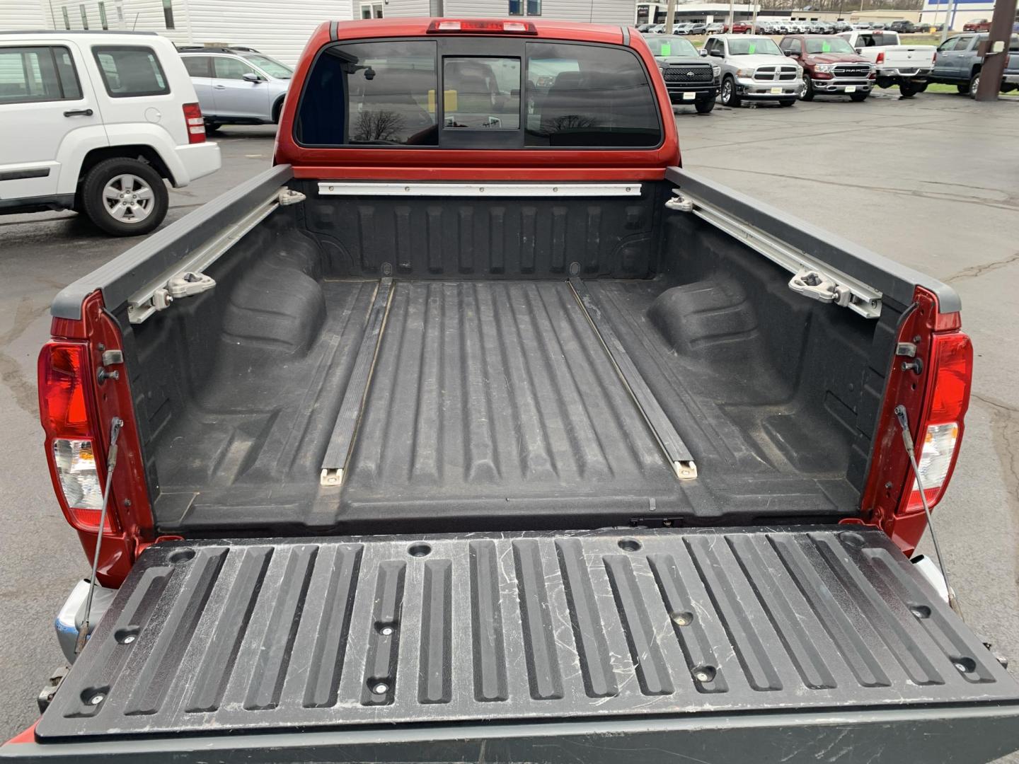 2016 MAROON /Black Cloth Nissan Frontier SV 4WD (1N6AD0CW1GN) with an 4.0L V6 engine, Automatic transmission, located at 506 S. Kingshighway, Cape Girardeau, MO, 63703, (573) 235-5000, 37.294991, -89.553635 - 2016 Nissan Frontier SV Only 93xxx miles 4x4 4.0L V6 Automatic Backup Camera Heated Seats Cruise Power Windows/Locks/Mirrors We have financing available and we accept trades! Fill out a credit application on our website or come by today! If you have any questions, give us a call at (573) - Photo#7