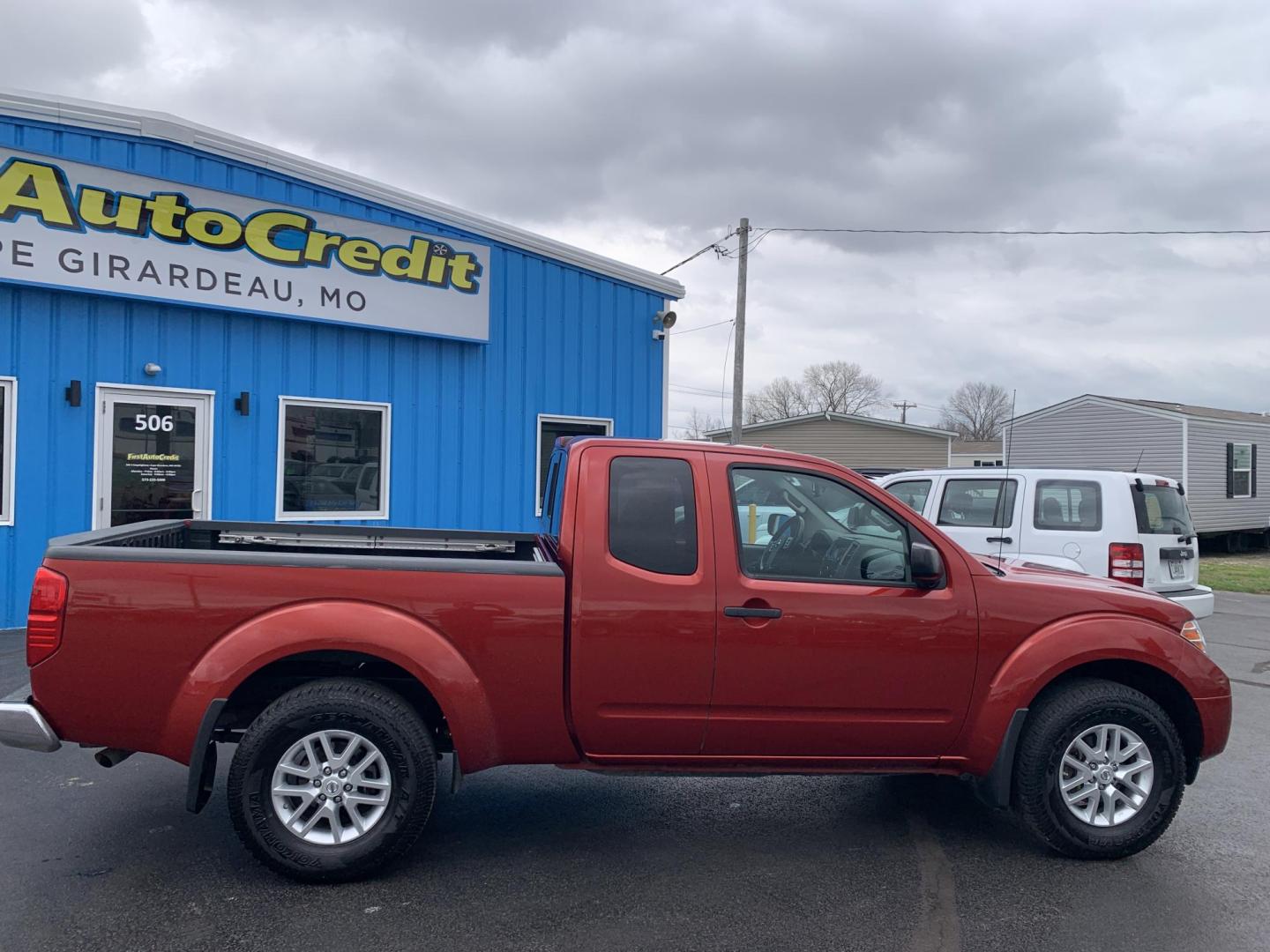 2016 MAROON /Black Cloth Nissan Frontier SV 4WD (1N6AD0CW1GN) with an 4.0L V6 engine, Automatic transmission, located at 506 S. Kingshighway, Cape Girardeau, MO, 63703, (573) 235-5000, 37.294991, -89.553635 - 2016 Nissan Frontier SV Only 93xxx miles 4x4 4.0L V6 Automatic Backup Camera Heated Seats Cruise Power Windows/Locks/Mirrors We have financing available and we accept trades! Fill out a credit application on our website or come by today! If you have any questions, give us a call at (573) - Photo#9