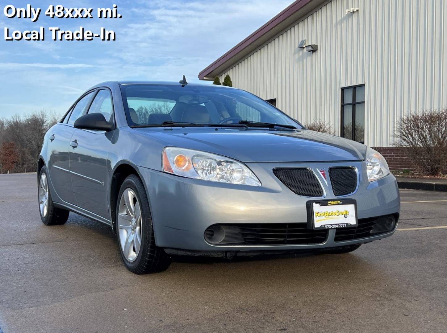 2009 GREY /Tan Cloth Pontiac G6 Sedan (1G2ZG57B694) with an 2.4L 4 Cyl. engine, 4-Speed Automatic Overdrive transmission, located at 2990 Old Orchard Rd., Jackson, MO, 63755, 37.354214, -89.612106 - 2009 Pontiac G6 Only 48xxx miles Front Wheel Drive 2.4L 4 Cyl. Automatic Cruise Power Windows/Locks/Mirrors We have financing available and we accept trades! Fill out a credit application on our website or come by today! If you have any questions, give us a call at (573) 204-7777 or visit ou - Photo#0