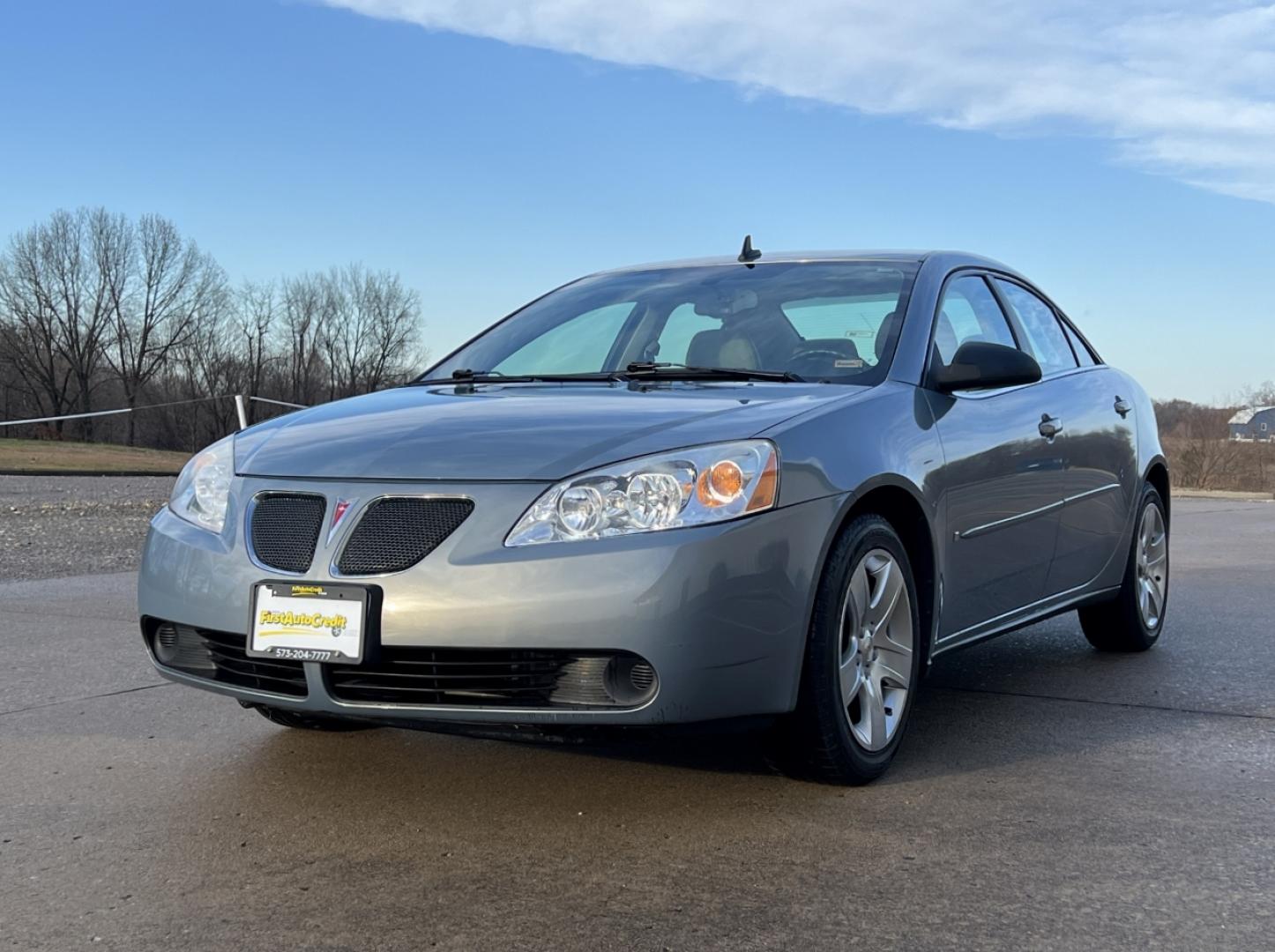2009 GREY /Tan Cloth Pontiac G6 Sedan (1G2ZG57B694) with an 2.4L 4 Cyl. engine, 4-Speed Automatic Overdrive transmission, located at 2990 Old Orchard Rd., Jackson, MO, 63755, 37.354214, -89.612106 - 2009 Pontiac G6 Only 48xxx miles Front Wheel Drive 2.4L 4 Cyl. Automatic Cruise Power Windows/Locks/Mirrors We have financing available and we accept trades! Fill out a credit application on our website or come by today! If you have any questions, give us a call at (573) 204-7777 or visit ou - Photo#2