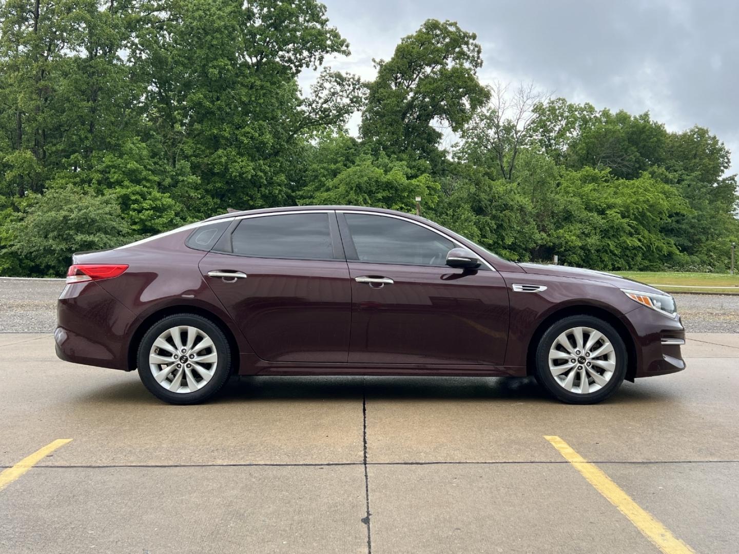 2016 MAROON /Black Cloth Kia Optima LX (5XXGT4L37GG) with an 2.4L 4 Cyl. engine, Automatic transmission, located at 506 S. Kingshighway, Cape Girardeau, MO, 63703, (573) 235-5000, 37.294991, -89.553635 - 2016 Kia Optima LX 112xxx miles Front Wheel Drive 2.4L 4 Cyl. Automatic Backup Camera Bluetooth Cruise Power Windows/Locks/Mirrors We have financing available and we accept trades! Fill out a credit application on our website or come by today! If you have any questions, give us a call at ( - Photo#5