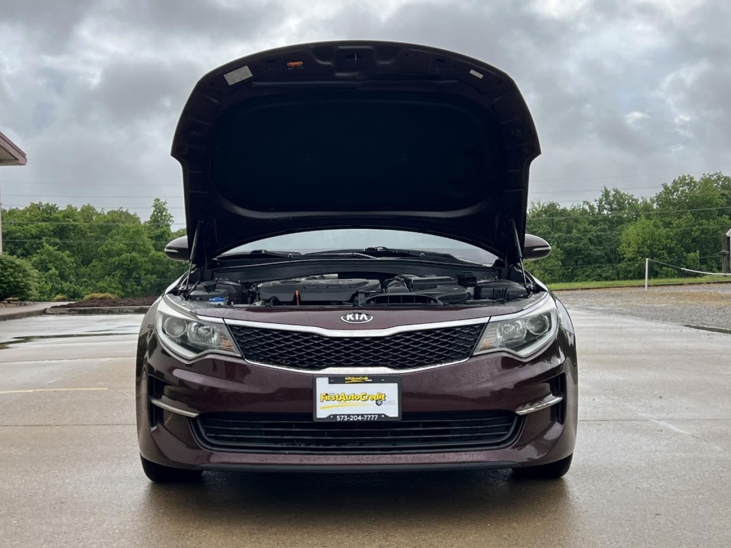 2016 MAROON /Black Cloth Kia Optima LX (5XXGT4L37GG) with an 2.4L 4 Cyl. engine, Automatic transmission, located at 506 S. Kingshighway, Cape Girardeau, MO, 63703, (573) 235-5000, 37.294991, -89.553635 - 2016 Kia Optima LX 112xxx miles Front Wheel Drive 2.4L 4 Cyl. Automatic Backup Camera Bluetooth Cruise Power Windows/Locks/Mirrors We have financing available and we accept trades! Fill out a credit application on our website or come by today! If you have any questions, give us a call at ( - Photo#26