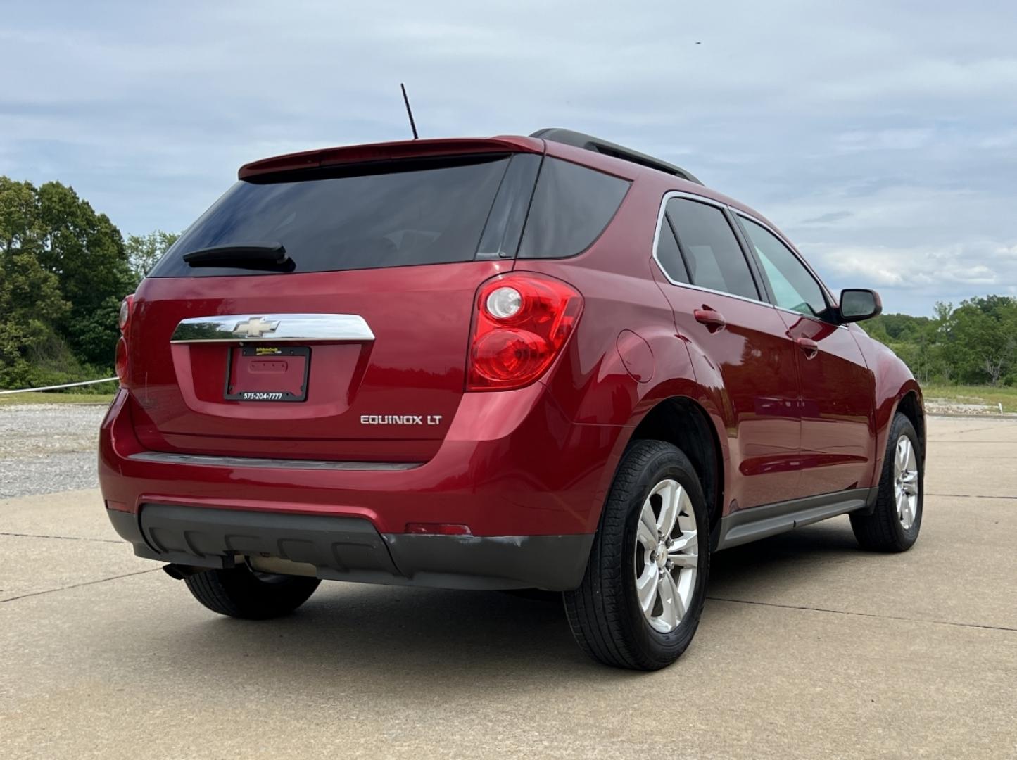 2015 RED /Tan Cloth Chevrolet Equinox 1LT 2WD (2GNALBEK6F1) with an 2.4L 4 Cyl. engine, Automatic transmission, located at 506 S. Kingshighway, Cape Girardeau, MO, 63703, (573) 235-5000, 37.294991, -89.553635 - 2015 Chevrolet Equinox LT 96xxx miles Front Wheel Drive 2.4L 4 Cyl. Automatic Backup Camera Bluetooth Cruise Power Windows/Locks/Mirrors We have financing available and we accept trades! Fill out a credit application on our website or come by today! If you have any questions, give us a cal - Photo#6
