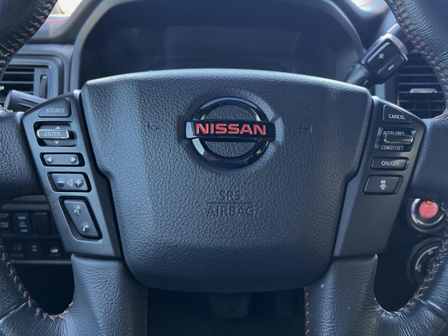 2021 RED /Black Leather/Cloth Nissan Titan PRO-4X (1N6AA1ED5MN) with an 5.6L V8 engine, Automatic transmission, located at 506 S. Kingshighway, Cape Girardeau, MO, 63703, (573) 235-5000, 37.294991, -89.553635 - 2021 Nissan Titan PRO-4X 1-Owner 136xxx miles 4x4 5.6L V8 Automatic Navigation Backup Camera Power Driver Seat Bluetooth Cruise Power Windows/Locks/Mirrors We have financing available and we accept trades! Fill out a credit application on our website or come by today! If you have any qu - Photo#22