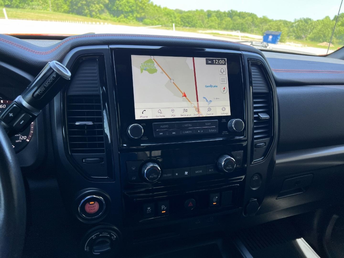 2021 RED /Black Leather/Cloth Nissan Titan PRO-4X (1N6AA1ED5MN) with an 5.6L V8 engine, Automatic transmission, located at 506 S. Kingshighway, Cape Girardeau, MO, 63703, (573) 235-5000, 37.294991, -89.553635 - 2021 Nissan Titan PRO-4X 1-Owner 136xxx miles 4x4 5.6L V8 Automatic Navigation Backup Camera Power Driver Seat Bluetooth Cruise Power Windows/Locks/Mirrors We have financing available and we accept trades! Fill out a credit application on our website or come by today! If you have any qu - Photo#24
