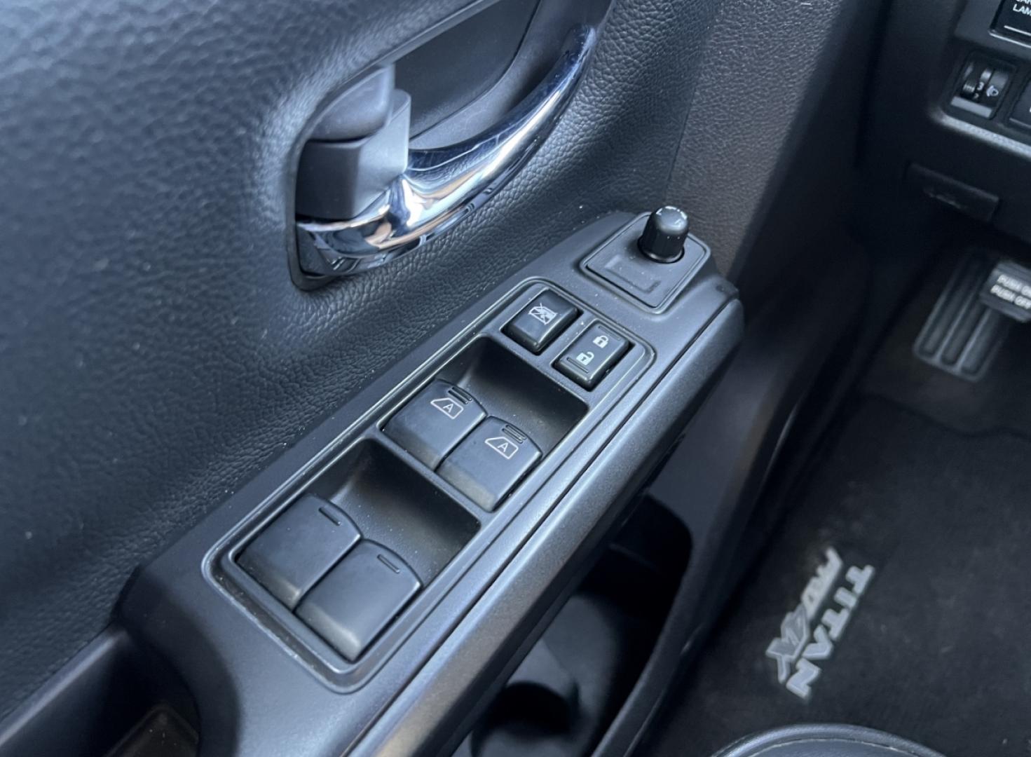 2021 RED /Black Leather/Cloth Nissan Titan PRO-4X (1N6AA1ED5MN) with an 5.6L V8 engine, Automatic transmission, located at 506 S. Kingshighway, Cape Girardeau, MO, 63703, (573) 235-5000, 37.294991, -89.553635 - 2021 Nissan Titan PRO-4X 1-Owner 136xxx miles 4x4 5.6L V8 Automatic Navigation Backup Camera Power Driver Seat Bluetooth Cruise Power Windows/Locks/Mirrors We have financing available and we accept trades! Fill out a credit application on our website or come by today! If you have any qu - Photo#27
