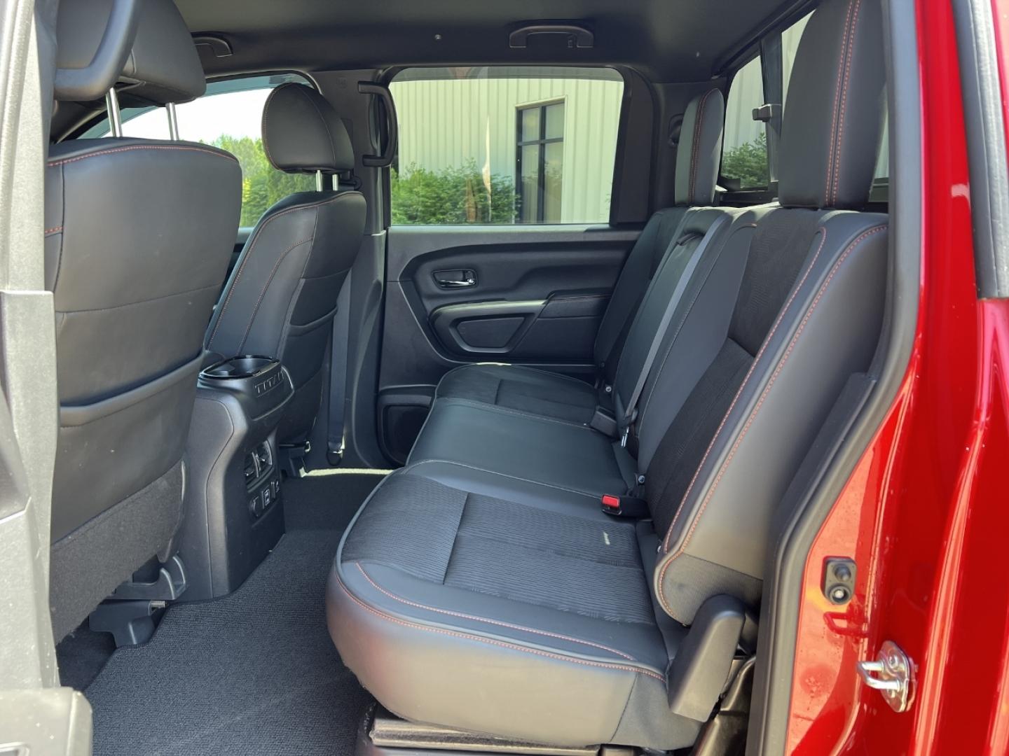 2021 RED /Black Leather/Cloth Nissan Titan PRO-4X (1N6AA1ED5MN) with an 5.6L V8 engine, Automatic transmission, located at 506 S. Kingshighway, Cape Girardeau, MO, 63703, (573) 235-5000, 37.294991, -89.553635 - 2021 Nissan Titan PRO-4X 1-Owner 136xxx miles 4x4 5.6L V8 Automatic Navigation Backup Camera Power Driver Seat Bluetooth Cruise Power Windows/Locks/Mirrors We have financing available and we accept trades! Fill out a credit application on our website or come by today! If you have any qu - Photo#17