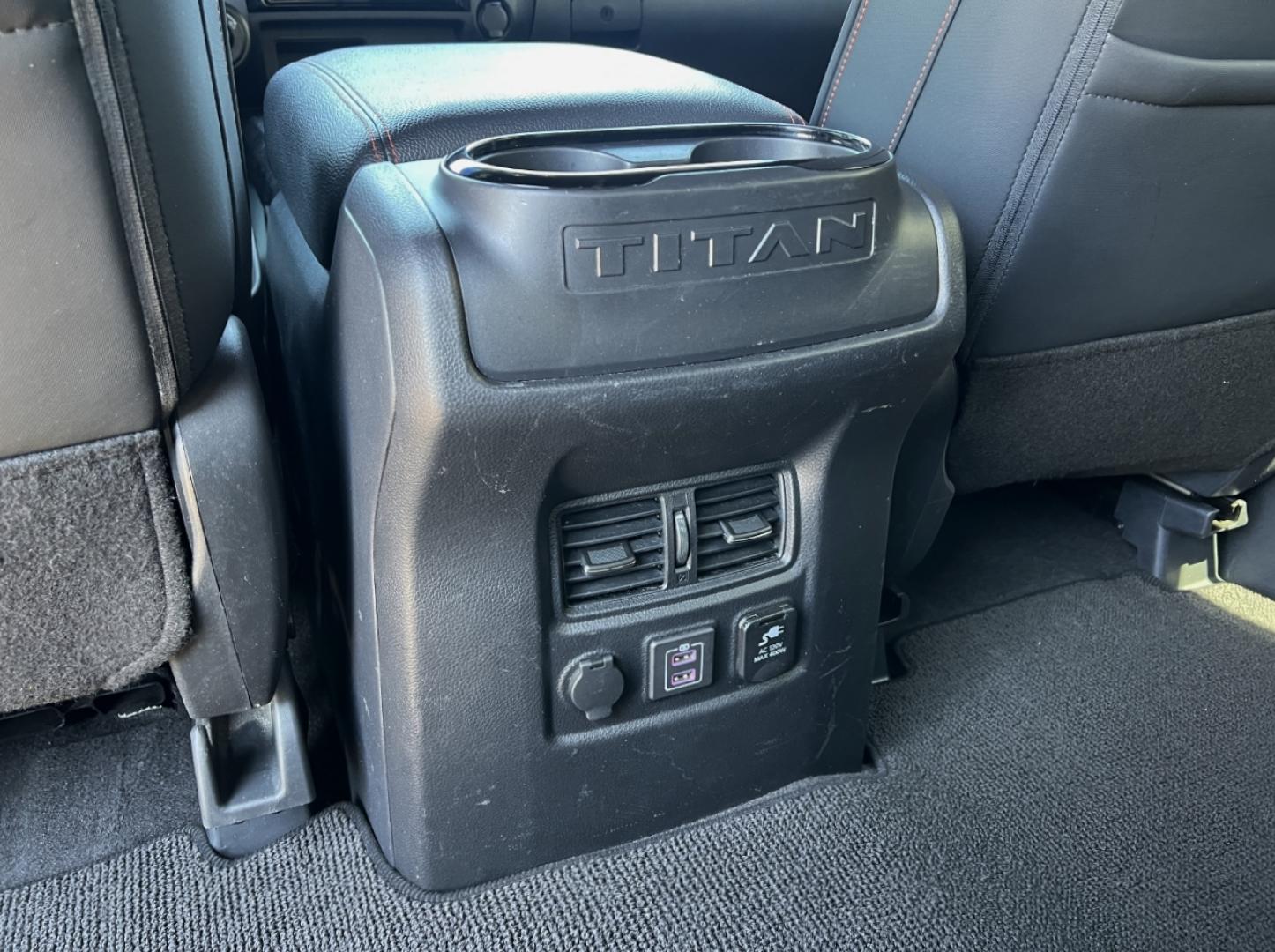 2021 RED /Black Leather/Cloth Nissan Titan PRO-4X (1N6AA1ED5MN) with an 5.6L V8 engine, Automatic transmission, located at 506 S. Kingshighway, Cape Girardeau, MO, 63703, (573) 235-5000, 37.294991, -89.553635 - 2021 Nissan Titan PRO-4X 1-Owner 136xxx miles 4x4 5.6L V8 Automatic Navigation Backup Camera Power Driver Seat Bluetooth Cruise Power Windows/Locks/Mirrors We have financing available and we accept trades! Fill out a credit application on our website or come by today! If you have any qu - Photo#31