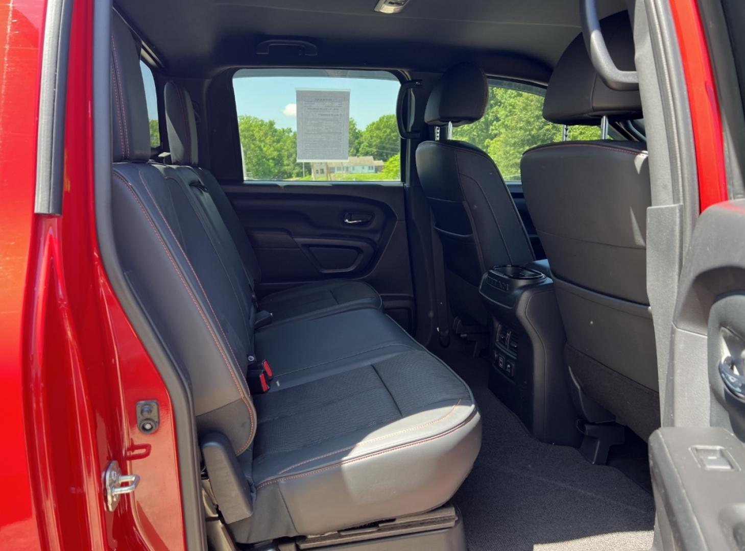 2021 RED /Black Leather/Cloth Nissan Titan PRO-4X (1N6AA1ED5MN) with an 5.6L V8 engine, Automatic transmission, located at 506 S. Kingshighway, Cape Girardeau, MO, 63703, (573) 235-5000, 37.294991, -89.553635 - 2021 Nissan Titan PRO-4X 1-Owner 136xxx miles 4x4 5.6L V8 Automatic Navigation Backup Camera Power Driver Seat Bluetooth Cruise Power Windows/Locks/Mirrors We have financing available and we accept trades! Fill out a credit application on our website or come by today! If you have any qu - Photo#18