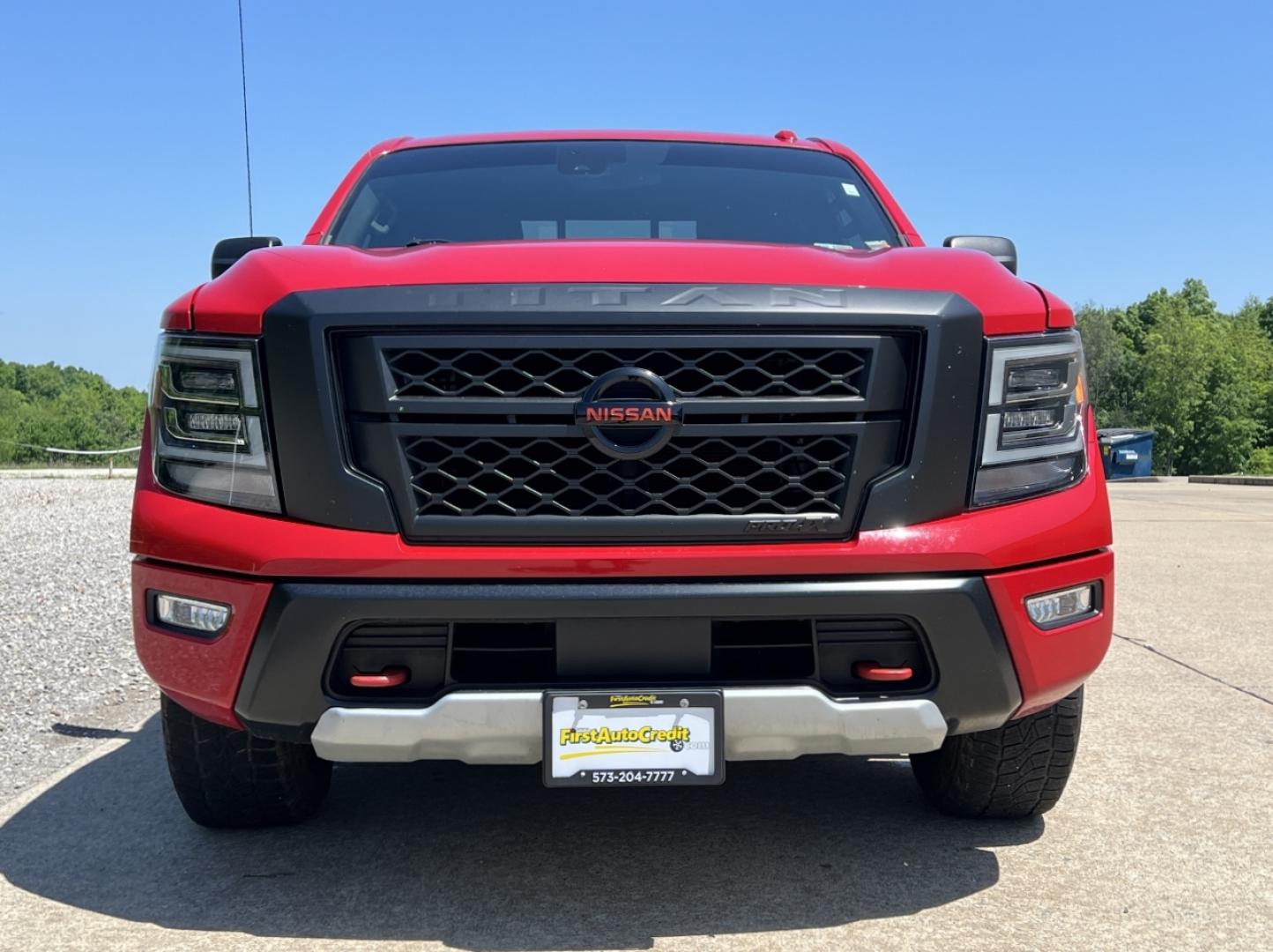 2021 RED /Black Leather/Cloth Nissan Titan PRO-4X (1N6AA1ED5MN) with an 5.6L V8 engine, Automatic transmission, located at 506 S. Kingshighway, Cape Girardeau, MO, 63703, (573) 235-5000, 37.294991, -89.553635 - 2021 Nissan Titan PRO-4X 1-Owner 136xxx miles 4x4 5.6L V8 Automatic Navigation Backup Camera Power Driver Seat Bluetooth Cruise Power Windows/Locks/Mirrors We have financing available and we accept trades! Fill out a credit application on our website or come by today! If you have any qu - Photo#12
