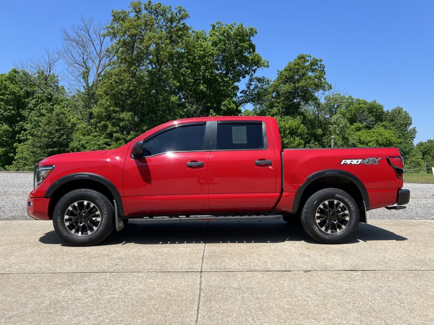 2021 RED /Black Leather/Cloth Nissan Titan PRO-4X (1N6AA1ED5MN) with an 5.6L V8 engine, Automatic transmission, located at 506 S. Kingshighway, Cape Girardeau, MO, 63703, (573) 235-5000, 37.294991, -89.553635 - 2021 Nissan Titan PRO-4X 1-Owner 136xxx miles 4x4 5.6L V8 Automatic Navigation Backup Camera Power Driver Seat Bluetooth Cruise Power Windows/Locks/Mirrors We have financing available and we accept trades! Fill out a credit application on our website or come by today! If you have any qu - Photo#7
