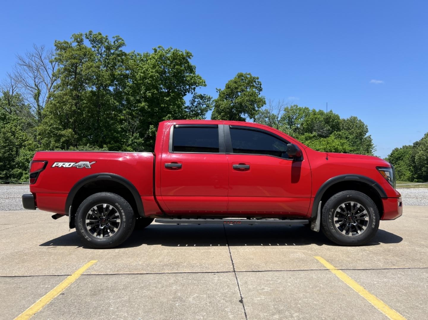 2021 RED /Black Leather/Cloth Nissan Titan PRO-4X (1N6AA1ED5MN) with an 5.6L V8 engine, Automatic transmission, located at 506 S. Kingshighway, Cape Girardeau, MO, 63703, (573) 235-5000, 37.294991, -89.553635 - 2021 Nissan Titan PRO-4X 1-Owner 136xxx miles 4x4 5.6L V8 Automatic Navigation Backup Camera Power Driver Seat Bluetooth Cruise Power Windows/Locks/Mirrors We have financing available and we accept trades! Fill out a credit application on our website or come by today! If you have any qu - Photo#8