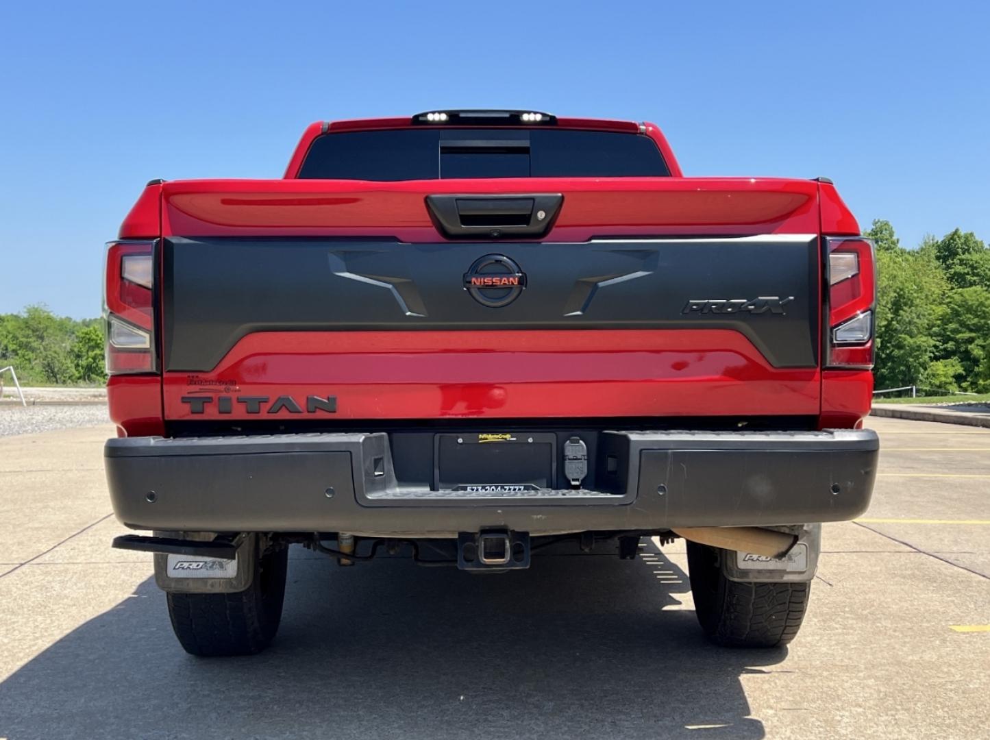 2021 RED /Black Leather/Cloth Nissan Titan PRO-4X (1N6AA1ED5MN) with an 5.6L V8 engine, Automatic transmission, located at 506 S. Kingshighway, Cape Girardeau, MO, 63703, (573) 235-5000, 37.294991, -89.553635 - 2021 Nissan Titan PRO-4X 1-Owner 136xxx miles 4x4 5.6L V8 Automatic Navigation Backup Camera Power Driver Seat Bluetooth Cruise Power Windows/Locks/Mirrors We have financing available and we accept trades! Fill out a credit application on our website or come by today! If you have any qu - Photo#11