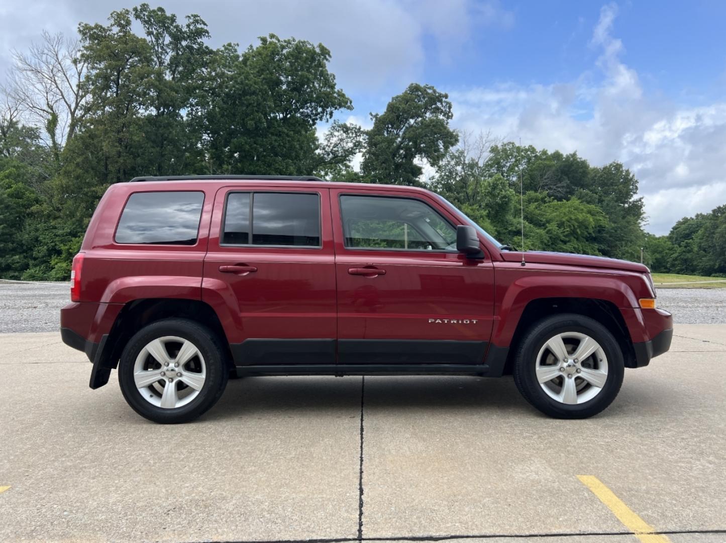 2011 RED /Tan Cloth Jeep Patriot 4WD (1J4NF1GB4BD) with an 2.4L 4 Cyl. engine, Automatic transmission, located at 506 S. Kingshighway, Cape Girardeau, MO, 63703, (573) 235-5000, 37.294991, -89.553635 - 2011 Jeep Patriot Sport 153xxx miles 4 Wheel Drive 2.4L 4 Cyl. Automatic Cruise Power Windows/Locks/Mirrors We have financing available and we accept trades! Fill out a credit application on our website or come by today! If you have any questions, give us a call at (573) 235-5000 or visit ou - Photo#5