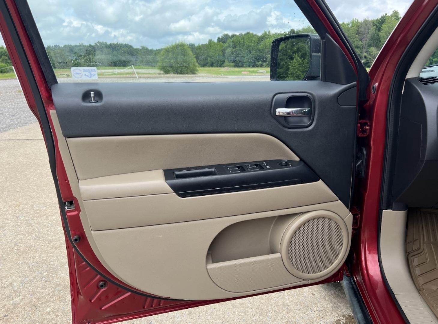 2011 RED /Tan Cloth Jeep Patriot 4WD (1J4NF1GB4BD) with an 2.4L 4 Cyl. engine, Automatic transmission, located at 506 S. Kingshighway, Cape Girardeau, MO, 63703, (573) 235-5000, 37.294991, -89.553635 - 2011 Jeep Patriot Sport 153xxx miles 4 Wheel Drive 2.4L 4 Cyl. Automatic Cruise Power Windows/Locks/Mirrors We have financing available and we accept trades! Fill out a credit application on our website or come by today! If you have any questions, give us a call at (573) 235-5000 or visit ou - Photo#10