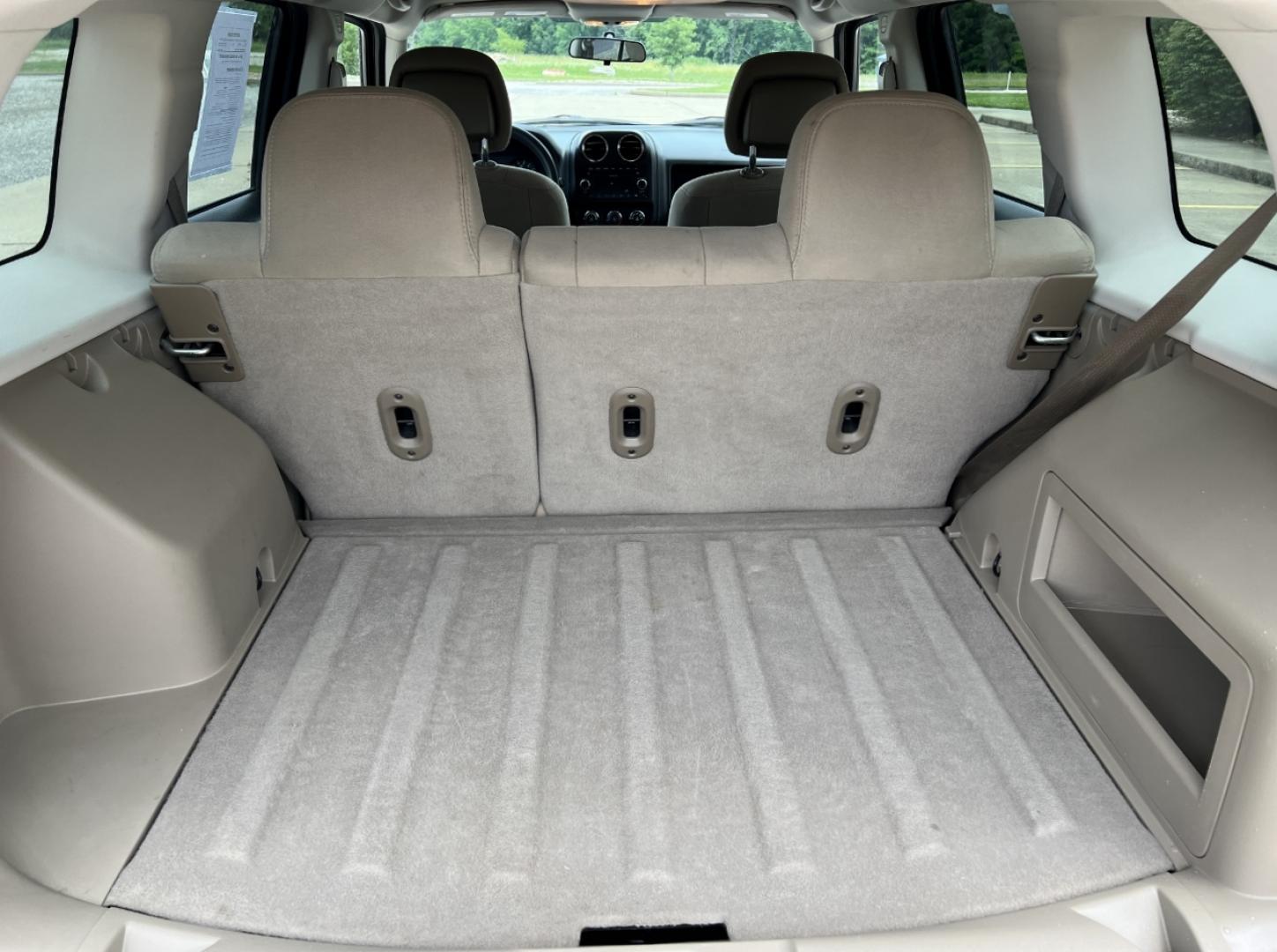 2011 RED /Tan Cloth Jeep Patriot 4WD (1J4NF1GB4BD) with an 2.4L 4 Cyl. engine, Automatic transmission, located at 506 S. Kingshighway, Cape Girardeau, MO, 63703, (573) 235-5000, 37.294991, -89.553635 - 2011 Jeep Patriot Sport 153xxx miles 4 Wheel Drive 2.4L 4 Cyl. Automatic Cruise Power Windows/Locks/Mirrors We have financing available and we accept trades! Fill out a credit application on our website or come by today! If you have any questions, give us a call at (573) 235-5000 or visit ou - Photo#17