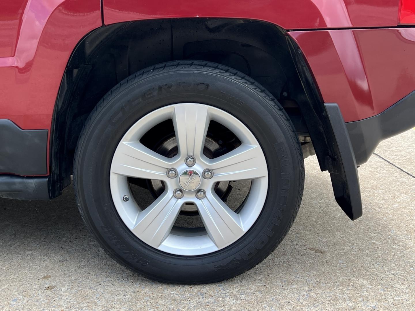 2011 RED /Tan Cloth Jeep Patriot 4WD (1J4NF1GB4BD) with an 2.4L 4 Cyl. engine, Automatic transmission, located at 506 S. Kingshighway, Cape Girardeau, MO, 63703, (573) 235-5000, 37.294991, -89.553635 - 2011 Jeep Patriot Sport 153xxx miles 4 Wheel Drive 2.4L 4 Cyl. Automatic Cruise Power Windows/Locks/Mirrors We have financing available and we accept trades! Fill out a credit application on our website or come by today! If you have any questions, give us a call at (573) 235-5000 or visit ou - Photo#29