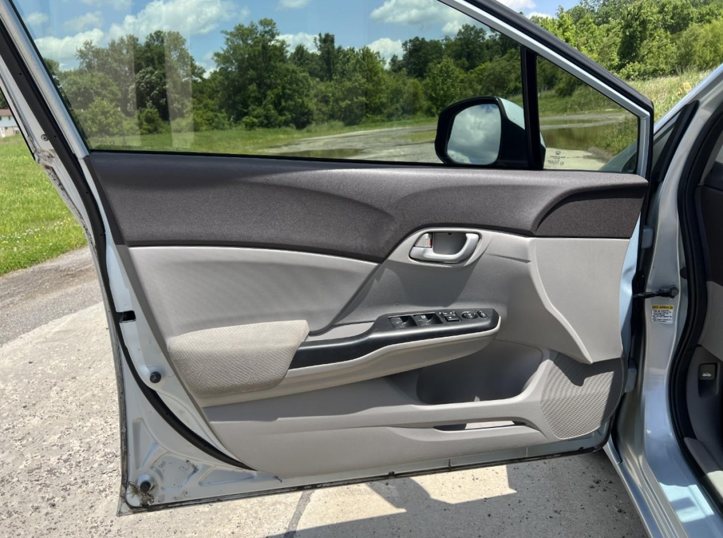 2012 BLUE /Gray Cloth Honda Civic LX Sedan 5-Speed AT (2HGFB2F52CH) with an 1.8L 4 Cyl. engine, Automatic transmission, located at 506 S. Kingshighway, Cape Girardeau, MO, 63703, (573) 235-5000, 37.294991, -89.553635 - 2012 Honda Civic LX 112xxx miles Front Wheel Drive 1.8L 4 Cyl. Automatic Cruise Power Windows/Locks/Mirrors We have financing available and we accept trades! Fill out a credit application on our website or come by today! If you have any questions, give us a call at (573) 235-5000 or visit ou - Photo#9