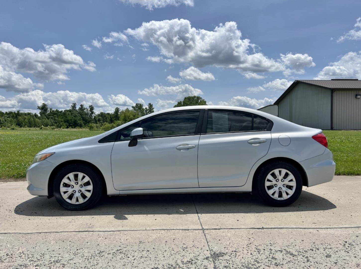 2012 BLUE /Gray Cloth Honda Civic LX Sedan 5-Speed AT (2HGFB2F52CH) with an 1.8L 4 Cyl. engine, Automatic transmission, located at 506 S. Kingshighway, Cape Girardeau, MO, 63703, (573) 235-5000, 37.294991, -89.553635 - 2012 Honda Civic LX 112xxx miles Front Wheel Drive 1.8L 4 Cyl. Automatic Cruise Power Windows/Locks/Mirrors We have financing available and we accept trades! Fill out a credit application on our website or come by today! If you have any questions, give us a call at (573) 235-5000 or visit ou - Photo#3