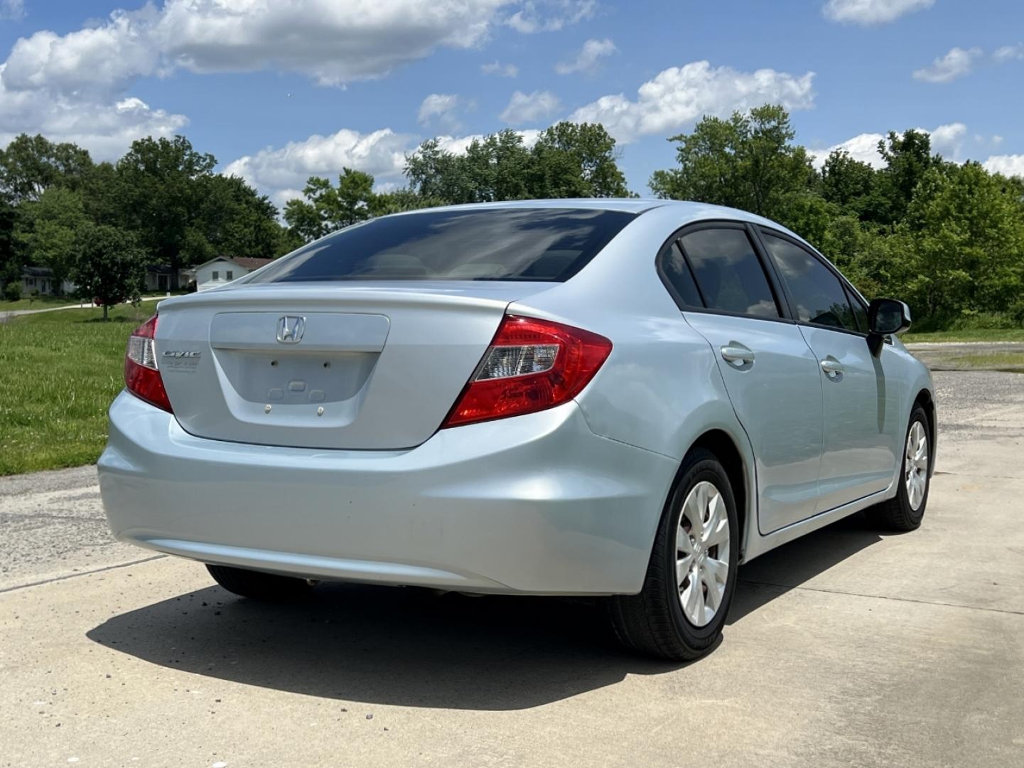 2012 BLUE /Gray Cloth Honda Civic LX Sedan 5-Speed AT (2HGFB2F52CH) with an 1.8L 4 Cyl. engine, Automatic transmission, located at 506 S. Kingshighway, Cape Girardeau, MO, 63703, (573) 235-5000, 37.294991, -89.553635 - 2012 Honda Civic LX 112xxx miles Front Wheel Drive 1.8L 4 Cyl. Automatic Cruise Power Windows/Locks/Mirrors We have financing available and we accept trades! Fill out a credit application on our website or come by today! If you have any questions, give us a call at (573) 235-5000 or visit ou - Photo#5