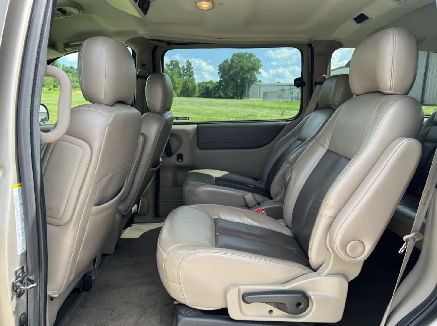 2002 GOLD /Tan Leather Oldsmobile Silhouette GL (1GHDX03E42D) with an 3.4L V6 engine, Automatic transmission, located at 506 S. Kingshighway, Cape Girardeau, MO, 63703, (573) 235-5000, 37.294991, -89.553635 - 2002 Oldsmobile Silhouette GL 139xxx miles Front Wheel Drive 3.4L V6 Automatic Leather 3rd Row Power/Heated Seats Cruise Power Windows/Locks/Mirrors We have financing available and we accept trades! Fill out a credit application on our website or come by today! If you have any questions, - Photo#15