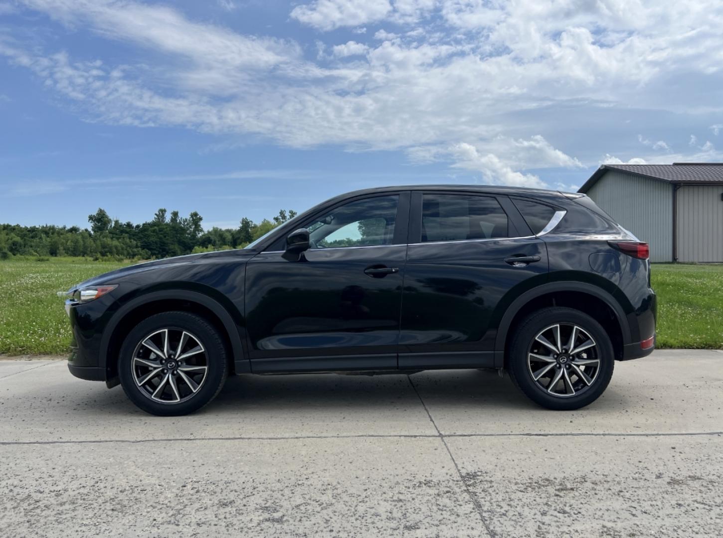 2018 BLACK /Black Mazda CX-5 Touring (JM3KFACM2J1) with an 2.5L 4 Cyl. engine, Automatic transmission, located at 506 S. Kingshighway, Cape Girardeau, MO, 63703, (573) 235-5000, 37.294991, -89.553635 - 2018 Mazda CX-5 Touring Only 38xxx miles Front Wheel Drive 2.5L 4 Cyl. Automatic Backup Camera Power Driver Seat Heated Seats Sunroof Bluetooth Cruise Power Windows/Locks/Mirrors We have financing available and we accept trades! Fill out a credit application on our website or come by tod - Photo#7