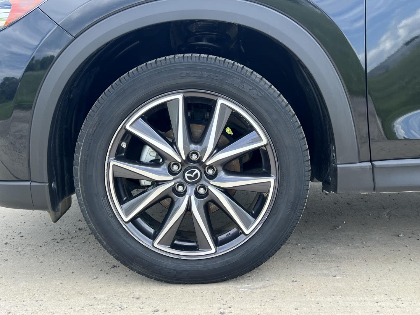 2018 BLACK /Black Mazda CX-5 Touring (JM3KFACM2J1) with an 2.5L 4 Cyl. engine, Automatic transmission, located at 506 S. Kingshighway, Cape Girardeau, MO, 63703, (573) 235-5000, 37.294991, -89.553635 - 2018 Mazda CX-5 Touring Only 38xxx miles Front Wheel Drive 2.5L 4 Cyl. Automatic Backup Camera Power Driver Seat Heated Seats Sunroof Bluetooth Cruise Power Windows/Locks/Mirrors We have financing available and we accept trades! Fill out a credit application on our website or come by tod - Photo#36