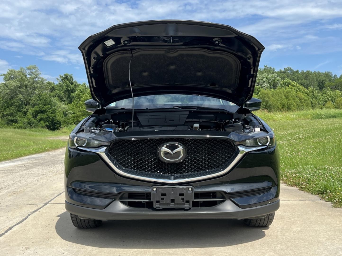 2018 BLACK /Black Mazda CX-5 Touring (JM3KFACM2J1) with an 2.5L 4 Cyl. engine, Automatic transmission, located at 506 S. Kingshighway, Cape Girardeau, MO, 63703, (573) 235-5000, 37.294991, -89.553635 - 2018 Mazda CX-5 Touring Only 38xxx miles Front Wheel Drive 2.5L 4 Cyl. Automatic Backup Camera Power Driver Seat Heated Seats Sunroof Bluetooth Cruise Power Windows/Locks/Mirrors We have financing available and we accept trades! Fill out a credit application on our website or come by tod - Photo#34