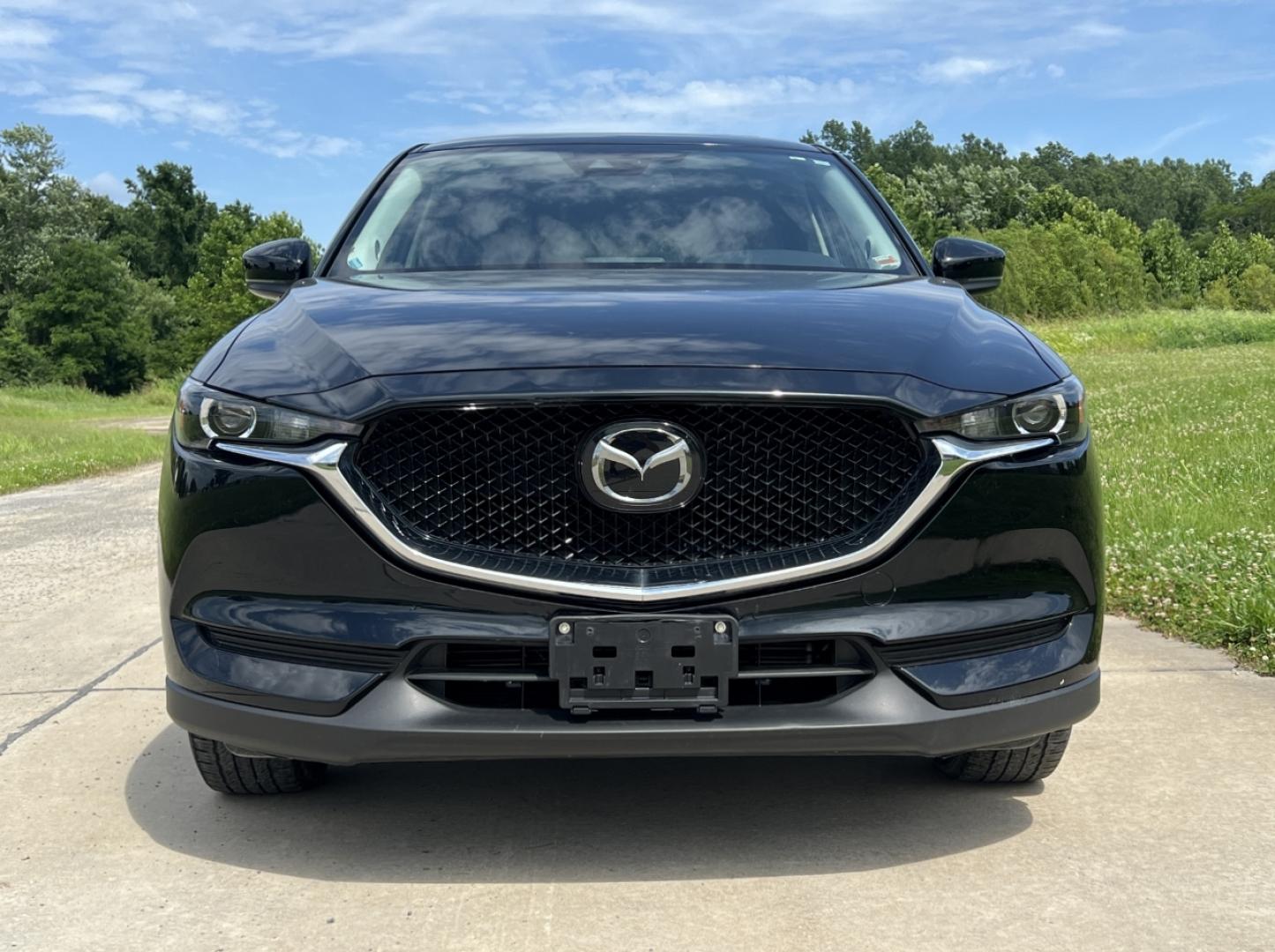 2018 BLACK /Black Mazda CX-5 Touring (JM3KFACM2J1) with an 2.5L 4 Cyl. engine, Automatic transmission, located at 506 S. Kingshighway, Cape Girardeau, MO, 63703, (573) 235-5000, 37.294991, -89.553635 - 2018 Mazda CX-5 Touring Only 38xxx miles Front Wheel Drive 2.5L 4 Cyl. Automatic Backup Camera Power Driver Seat Heated Seats Sunroof Bluetooth Cruise Power Windows/Locks/Mirrors We have financing available and we accept trades! Fill out a credit application on our website or come by tod - Photo#12