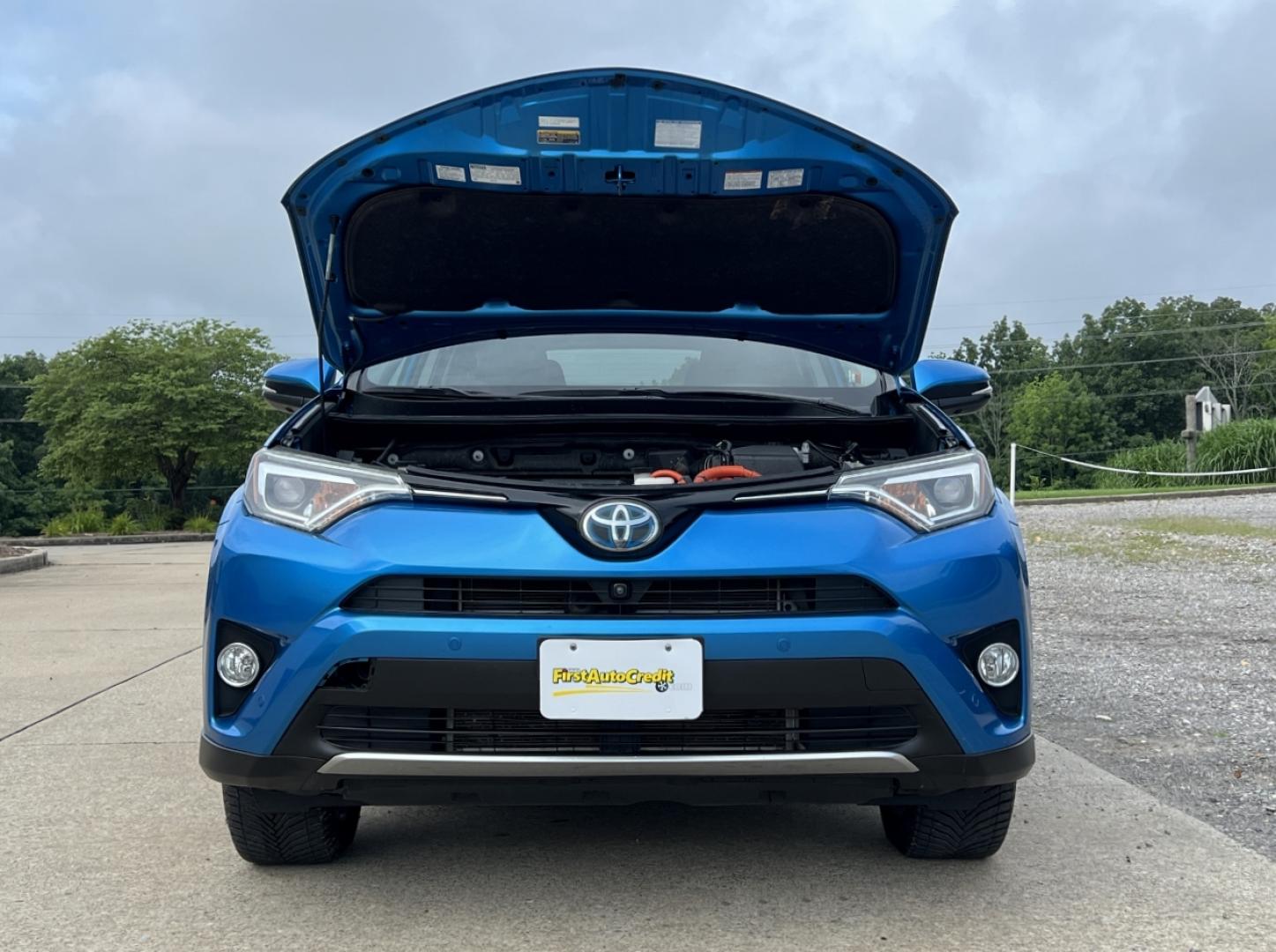 2016 BLUE /Black Leather Toyota RAV4 Hybrid Limited (JTMDJREV2GD) with an 2.5L 4 Cyl. Hybrid engine, CVT transmission, located at 2990 Old Orchard Rd., Jackson, MO, 63755, 37.354214, -89.612106 - 2016 Toyota RAV4 Hybrid Limited 104xxx miles All Wheel Drive 2.5L 4 Cyl. Hybrid Automatic Leather Backup Camera Power Driver Seat Heated Seats Sunroof Cruise Power Windows/Locks/Mirrors We have financing available and we accept trades! Fill out a credit application on our website or come - Photo#37