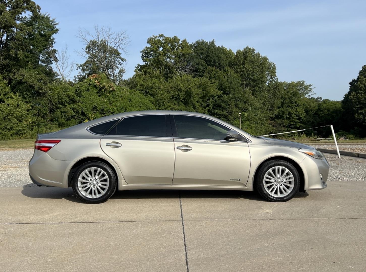 2014 TAN /Tan Leather Toyota Avalon Hybrid XLE Premium (4T1BD1EB6EU) with an 2.5L 4 Cyl. HYBRID engine, Continuously Variable Transmission transmission, located at 2990 Old Orchard Rd., Jackson, MO, 63755, 37.354214, -89.612106 - 2014 Toyota Avalon XLE Hybrid 135xxx miles Front Wheel Drive 2.5L 4 Cyl. Hybrid Automatic Leather Backup Camera Power/Heated Seats Sunroof Bluetooth Cruise Power Windows/Locks/Mirrors We have financing available and we accept trades! Fill out a credit application on our website or come b - Photo#8