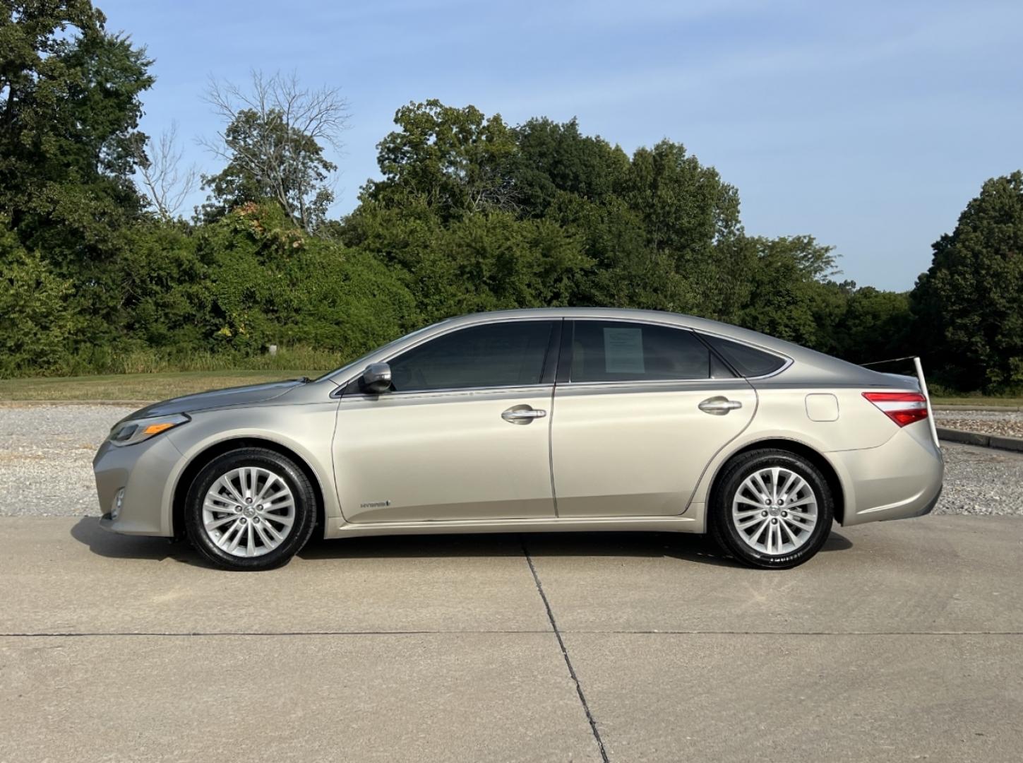2014 TAN /Tan Leather Toyota Avalon Hybrid XLE Premium (4T1BD1EB6EU) with an 2.5L 4 Cyl. HYBRID engine, Continuously Variable Transmission transmission, located at 2990 Old Orchard Rd., Jackson, MO, 63755, 37.354214, -89.612106 - 2014 Toyota Avalon XLE Hybrid 135xxx miles Front Wheel Drive 2.5L 4 Cyl. Hybrid Automatic Leather Backup Camera Power/Heated Seats Sunroof Bluetooth Cruise Power Windows/Locks/Mirrors We have financing available and we accept trades! Fill out a credit application on our website or come b - Photo#7