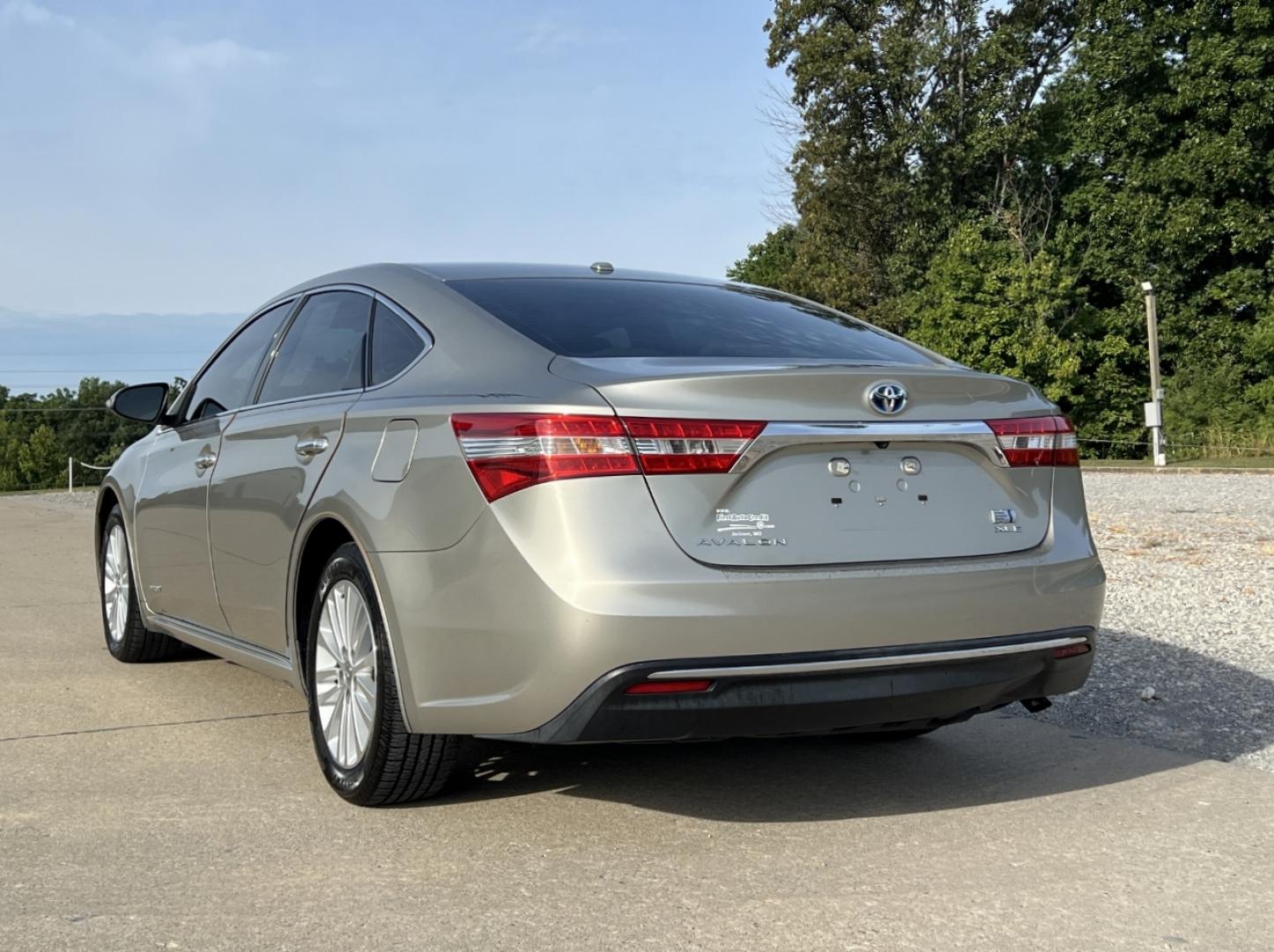 2014 TAN /Tan Leather Toyota Avalon Hybrid XLE Premium (4T1BD1EB6EU) with an 2.5L 4 Cyl. HYBRID engine, Continuously Variable Transmission transmission, located at 2990 Old Orchard Rd., Jackson, MO, 63755, 37.354214, -89.612106 - 2014 Toyota Avalon XLE Hybrid 135xxx miles Front Wheel Drive 2.5L 4 Cyl. Hybrid Automatic Leather Backup Camera Power/Heated Seats Sunroof Bluetooth Cruise Power Windows/Locks/Mirrors We have financing available and we accept trades! Fill out a credit application on our website or come b - Photo#10