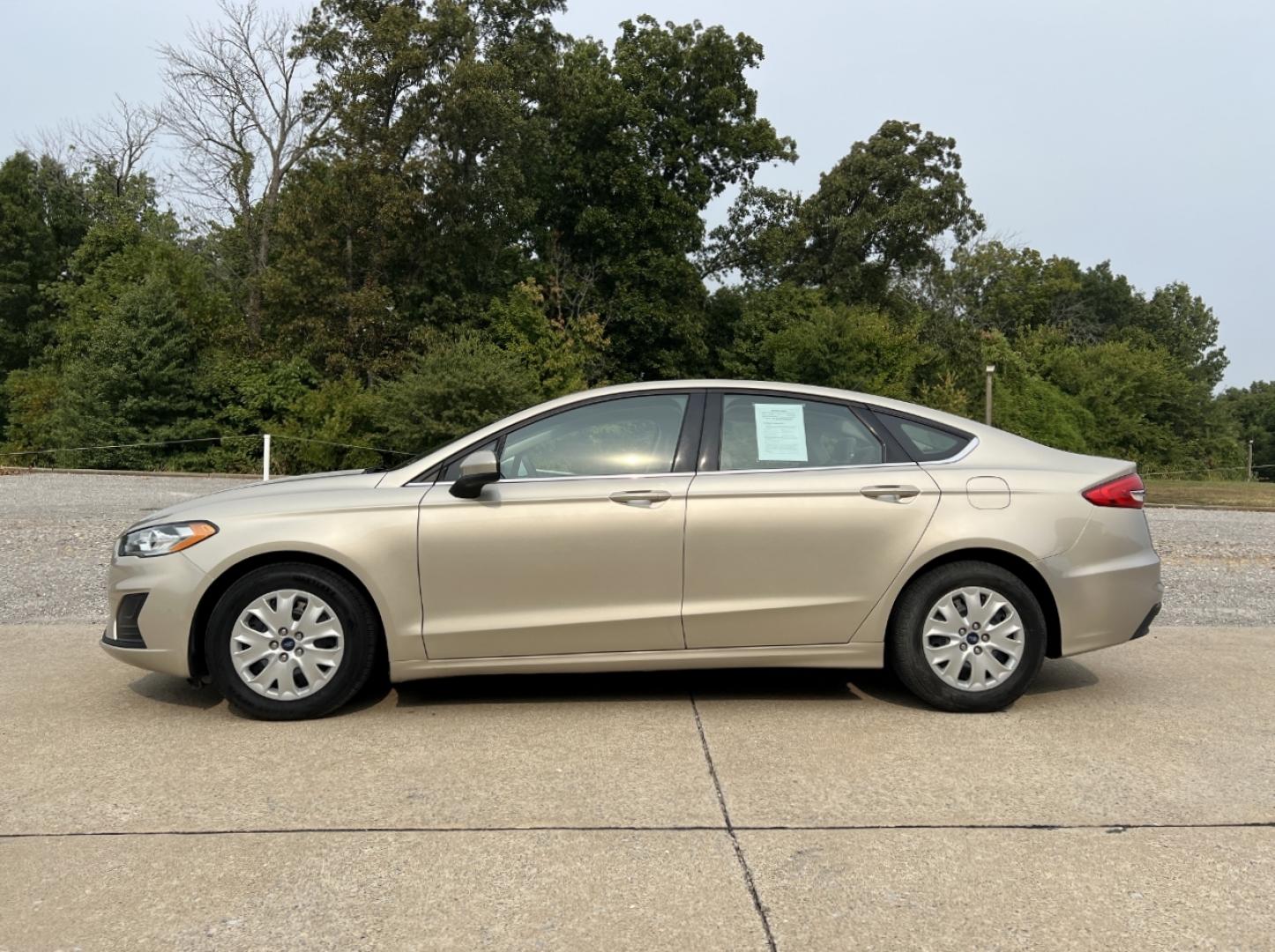2019 GOLD /Tan Cloth Ford Fusion S (3FA6P0G79KR) with an 2.5L 4 Cyl. engine, Automatic transmission, located at 2990 Old Orchard Rd., Jackson, MO, 63755, 37.354214, -89.612106 - 2019 Ford Fusion S Only 57xxx miles Front Wheel Drive 2.5L 4 Cyl. Automatic Backup Camera Bluetooth Cruise Power Windows/Locks/Mirrors We have financing available and we accept trades! Fill out a credit application on our website or come by today! If you have any questions, give us a call - Photo#4