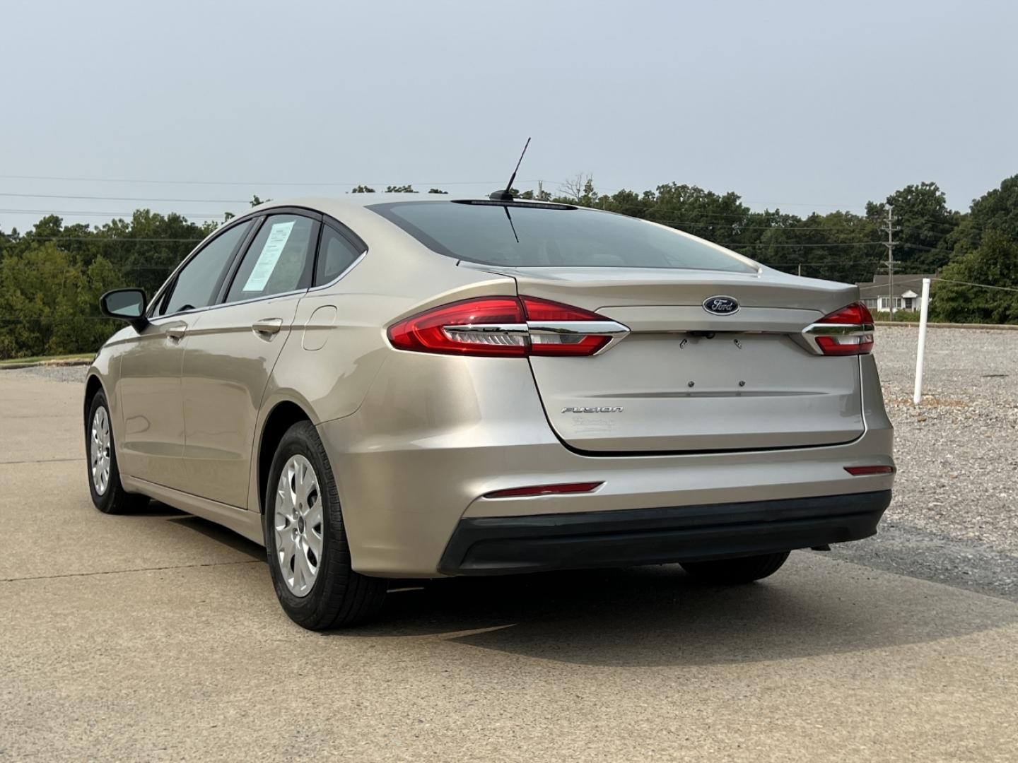 2019 GOLD /Tan Cloth Ford Fusion S (3FA6P0G79KR) with an 2.5L 4 Cyl. engine, Automatic transmission, located at 2990 Old Orchard Rd., Jackson, MO, 63755, 37.354214, -89.612106 - 2019 Ford Fusion S Only 57xxx miles Front Wheel Drive 2.5L 4 Cyl. Automatic Backup Camera Bluetooth Cruise Power Windows/Locks/Mirrors We have financing available and we accept trades! Fill out a credit application on our website or come by today! If you have any questions, give us a call - Photo#7